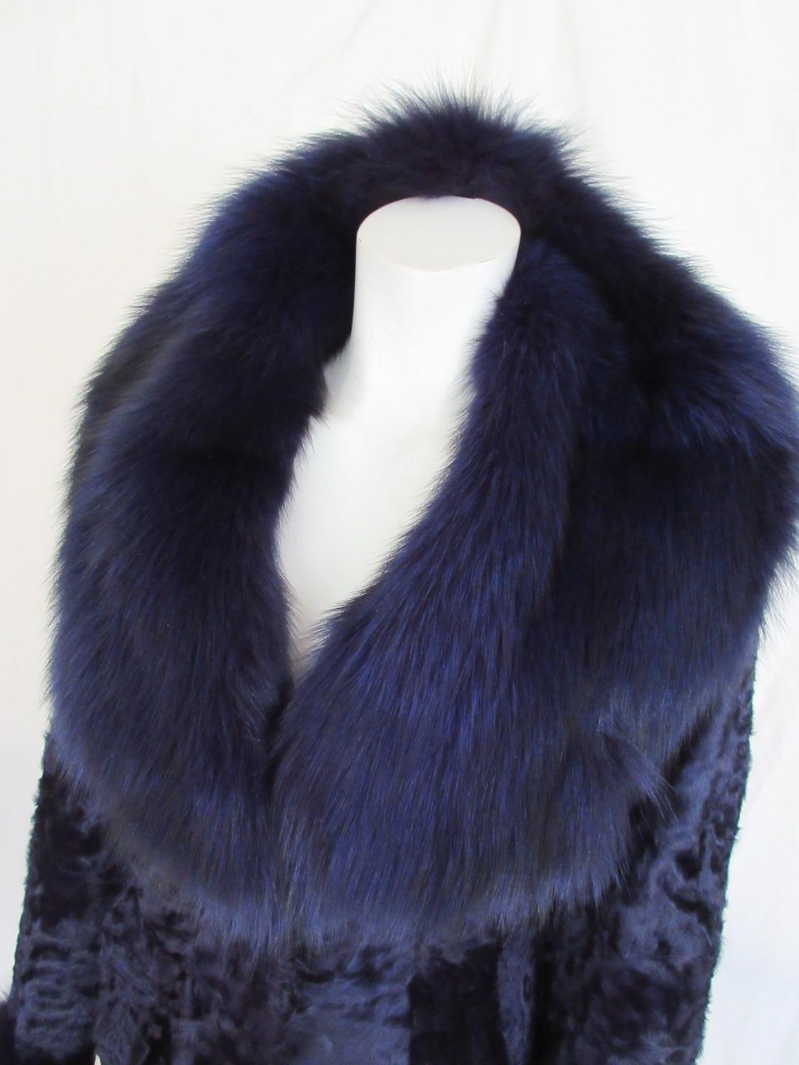 Beautiful vintage rare dyed purple/blue lamb fur with fox fur details 

We offer more luxurious fur items, view our frontstore

Details:
With 2 side pockets, 1 inside pocket and 2 closing hooks.
Purple/blue shades, the colour is difficult to see on
