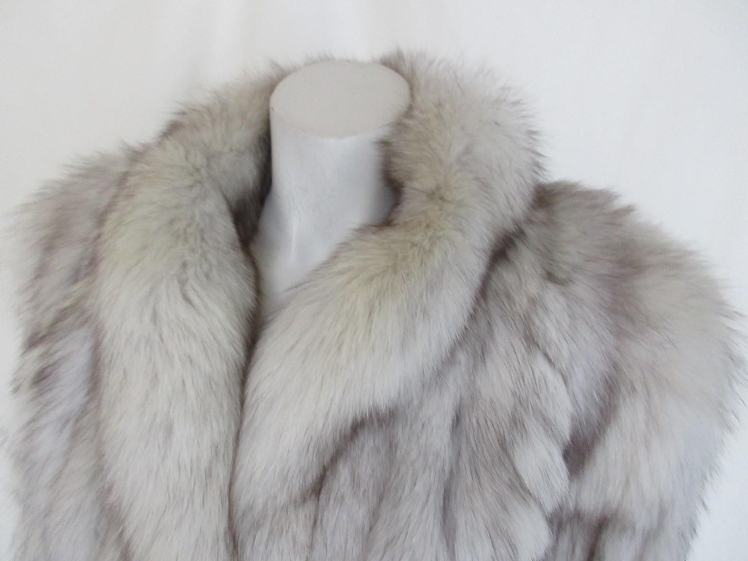Exclusive SAGA Scandinavian white fox fur coat

We offer more exclusive fur items. view our frontstore

 Details:
With 2 pockets and 3 closing hooks 
fully lined
Fox fur feels very soft
Pristine condition
Size is aprox. medium/large, please check