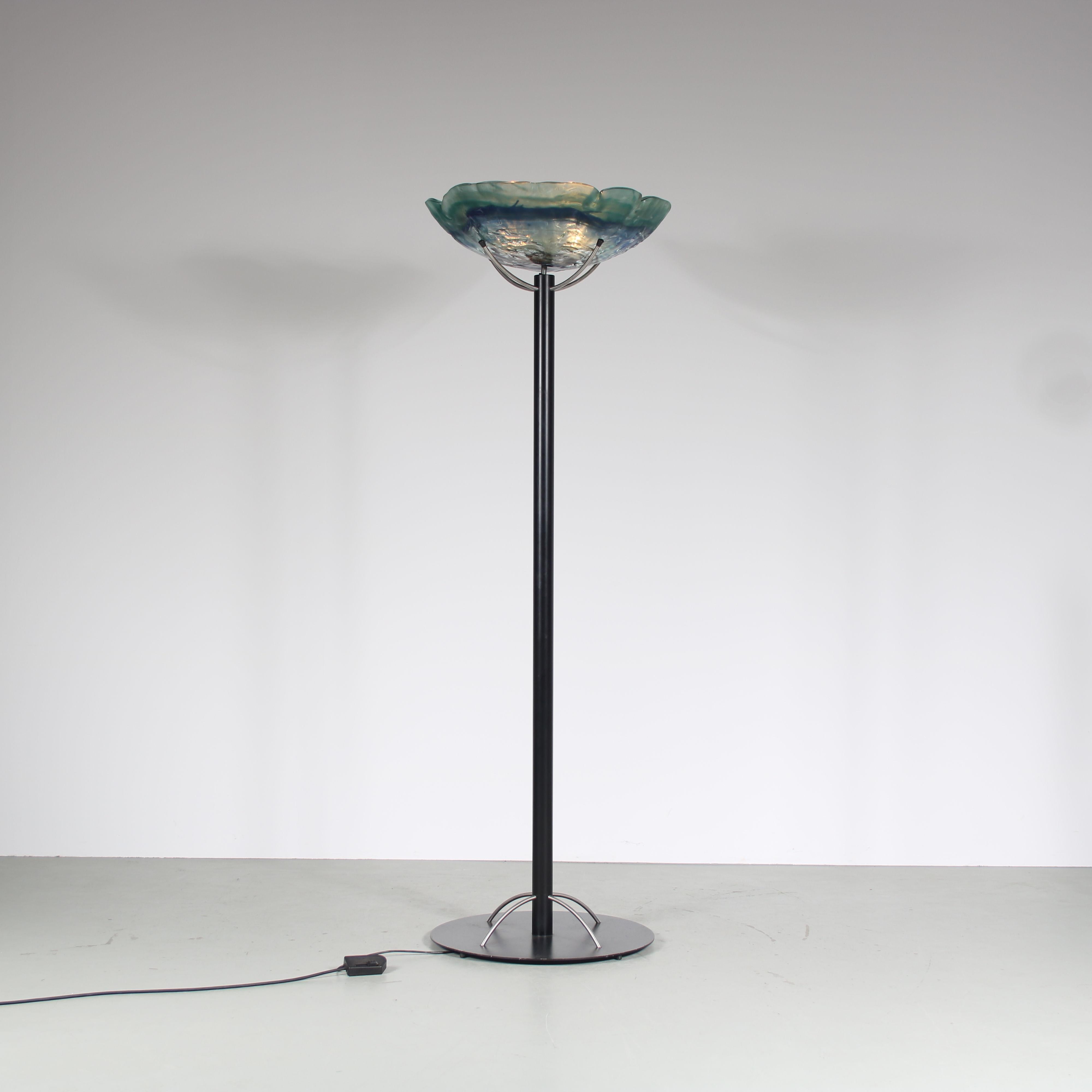 An exquisite piece from the 1980s, this XL black metal floor lamp is a true statement of elegance and artistry. Designed by Louis La Rooy and produced by Van Tetterode Amsterdam in the Netherlands, it showcases exceptional craftsmanship and