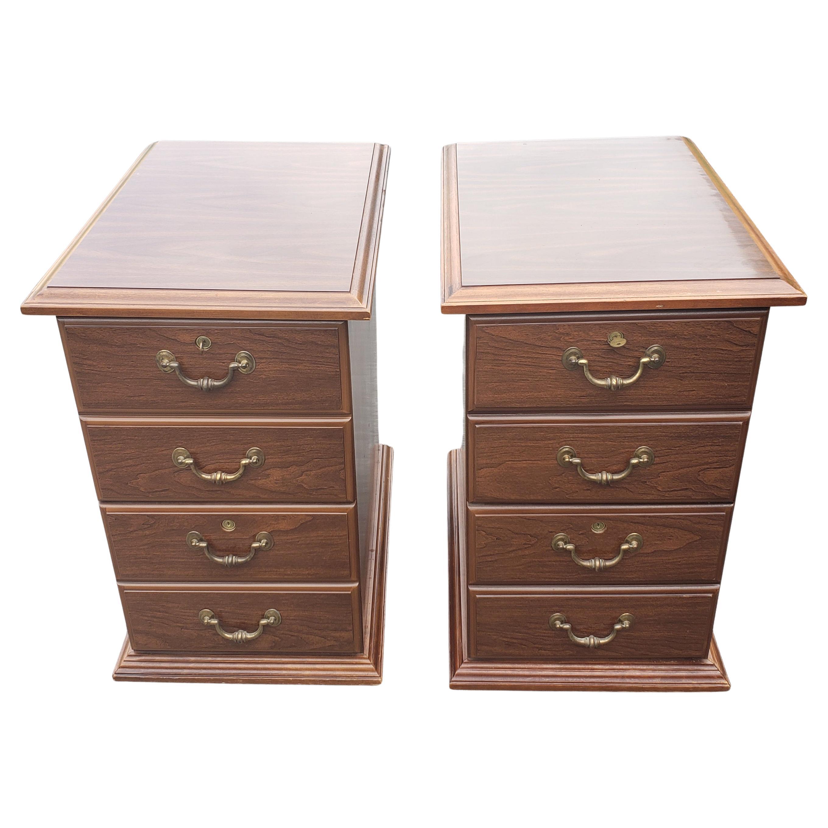 Striking two-drawer Chippendale filing cabinets in great condition. For both Legal and letter size hanging file folders. Comes with key. Each drawer independently locking. Measures 18.25