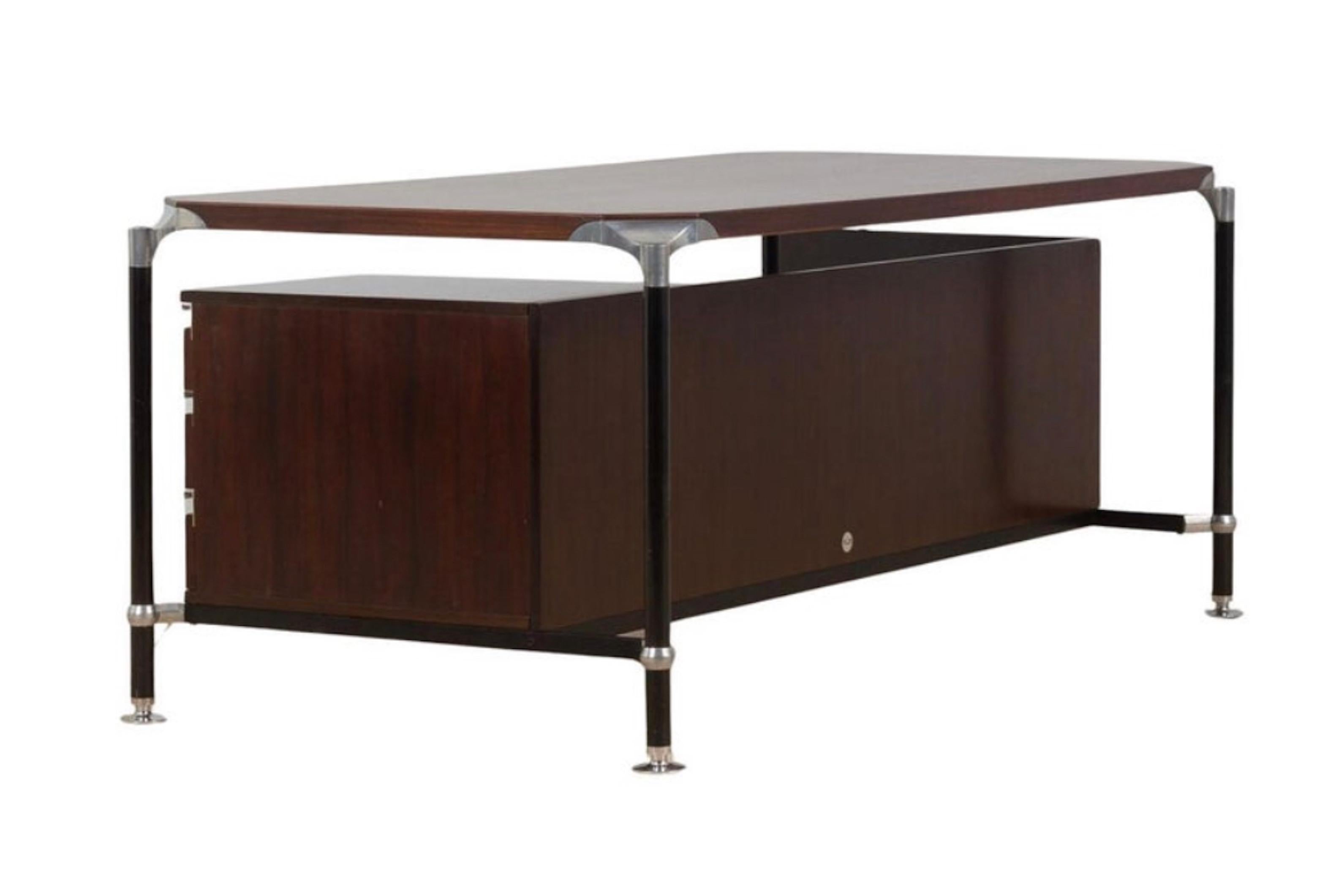 An executive desk designed by the Italian Designers Ico & Luisa Parisi for MIM Rome in 1962 . Structure made from lacquered steel with aluminium supports , there’re three floating drawers to the side with aluminium handles . The rear is a full size