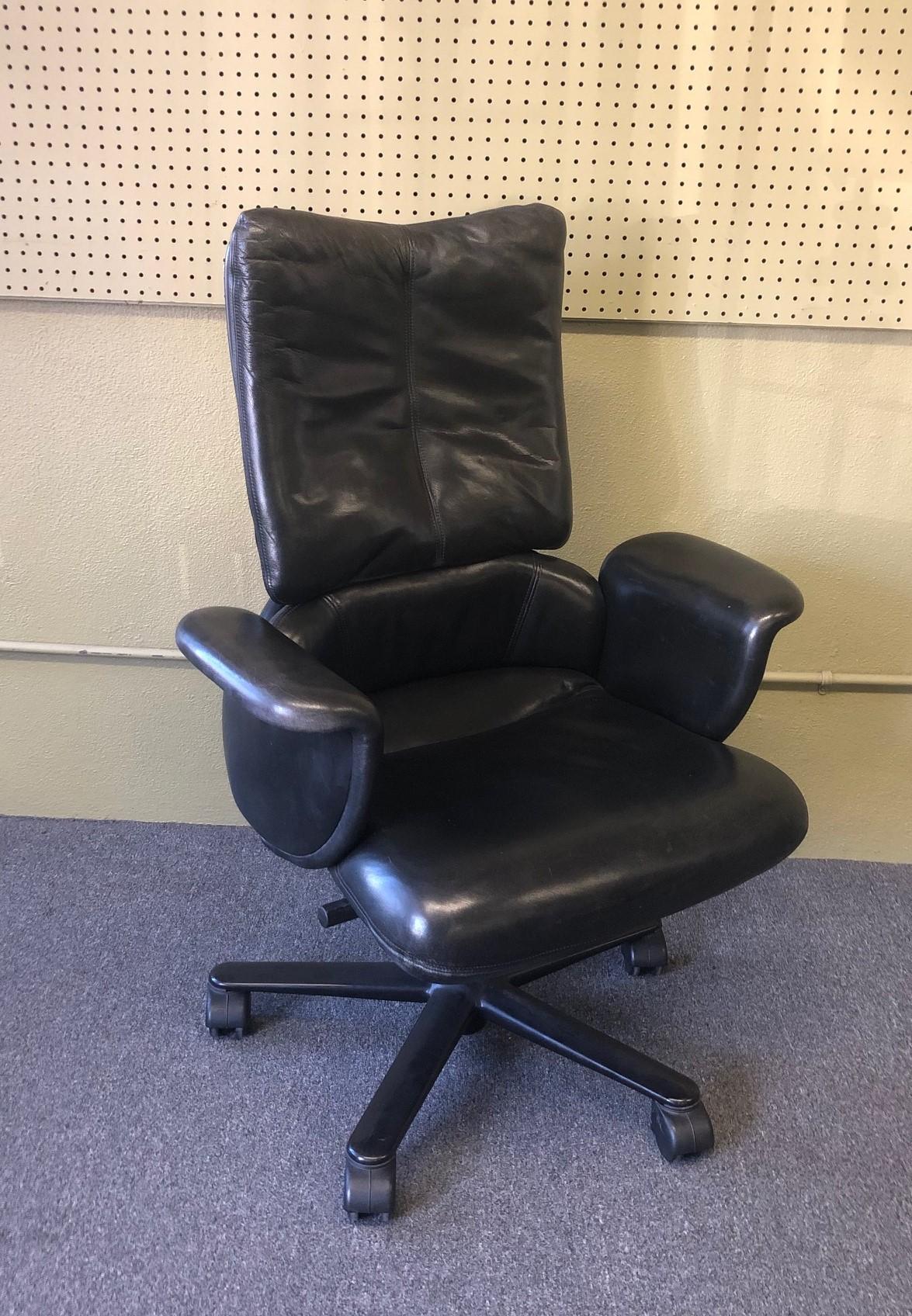 A very nice executive high back leather office chair by Geoff Hollington for Herman Miller, circa 1990s.

This is an office work chair for professionals, the product belies its engineered, mechanical nature by being essentially non-mechanical in