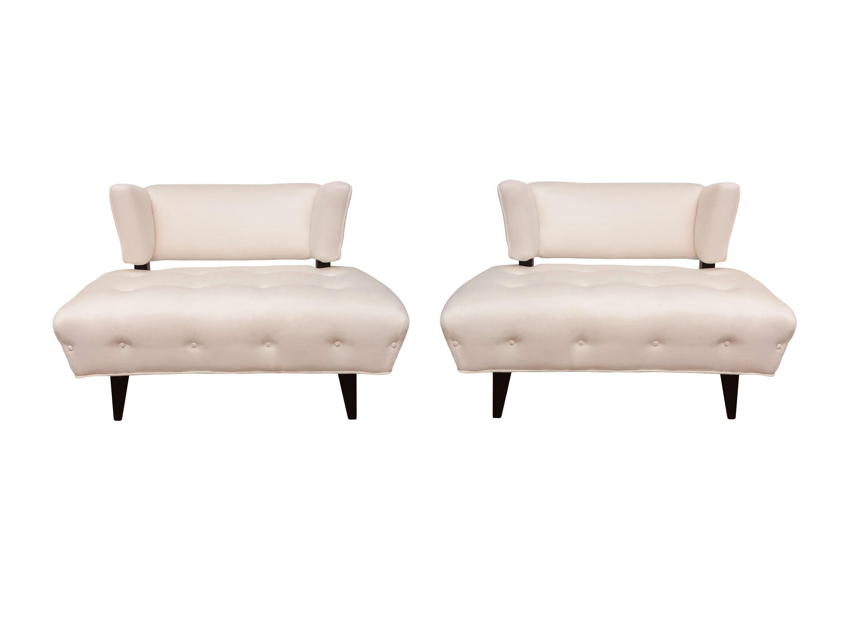 Pair of modernist slipper lounge chairs, circa 1950s. This extremely rare and fabulous design is routinely attributed to the work of the venerable American interior designer William 