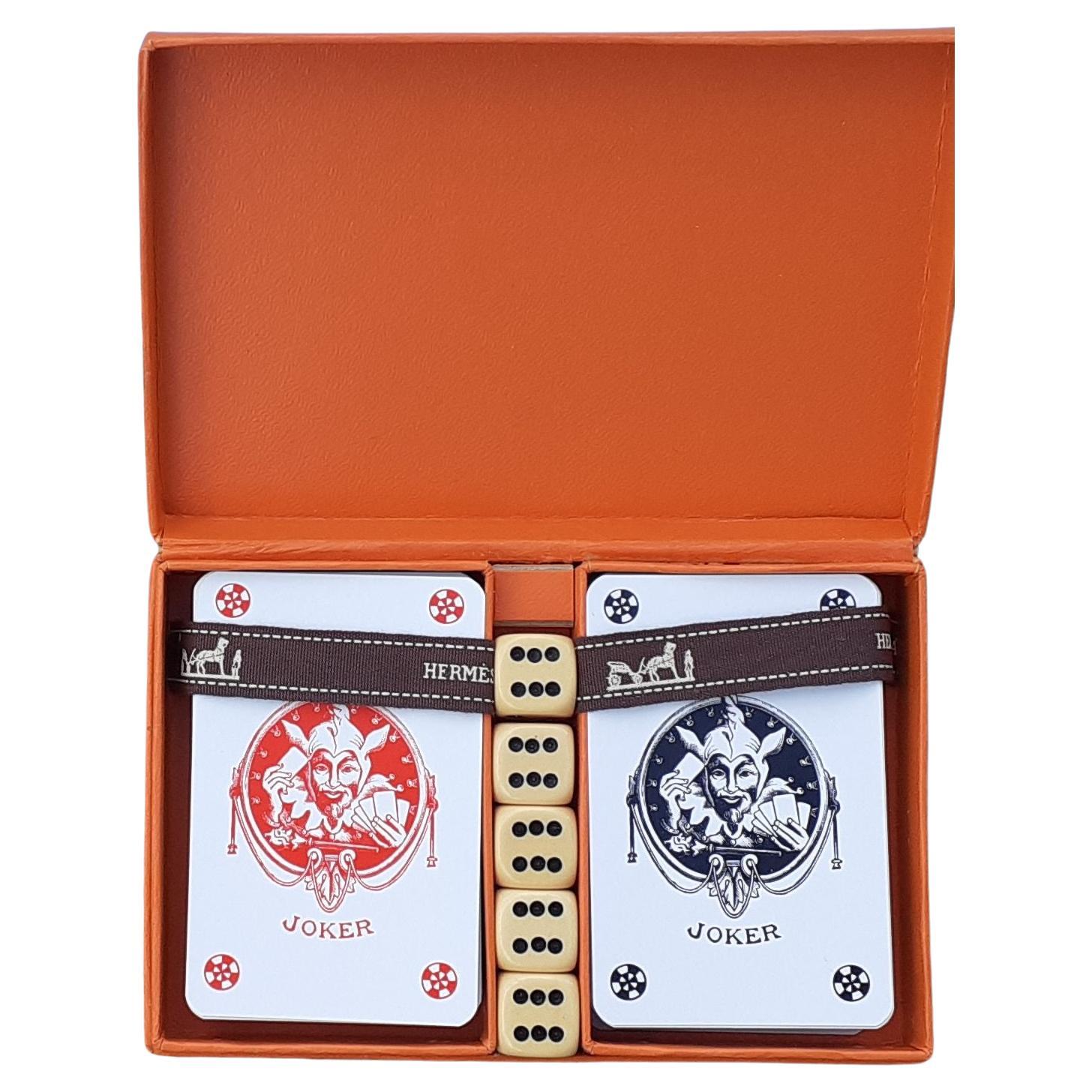 Rare Authentic Hermès Card Games

Specially manufactured for the liner Lydia, the back of each card is decorated with the design of the liner

The box includes 2 complete sets of 54 cards and 5 dices

The box is signed 