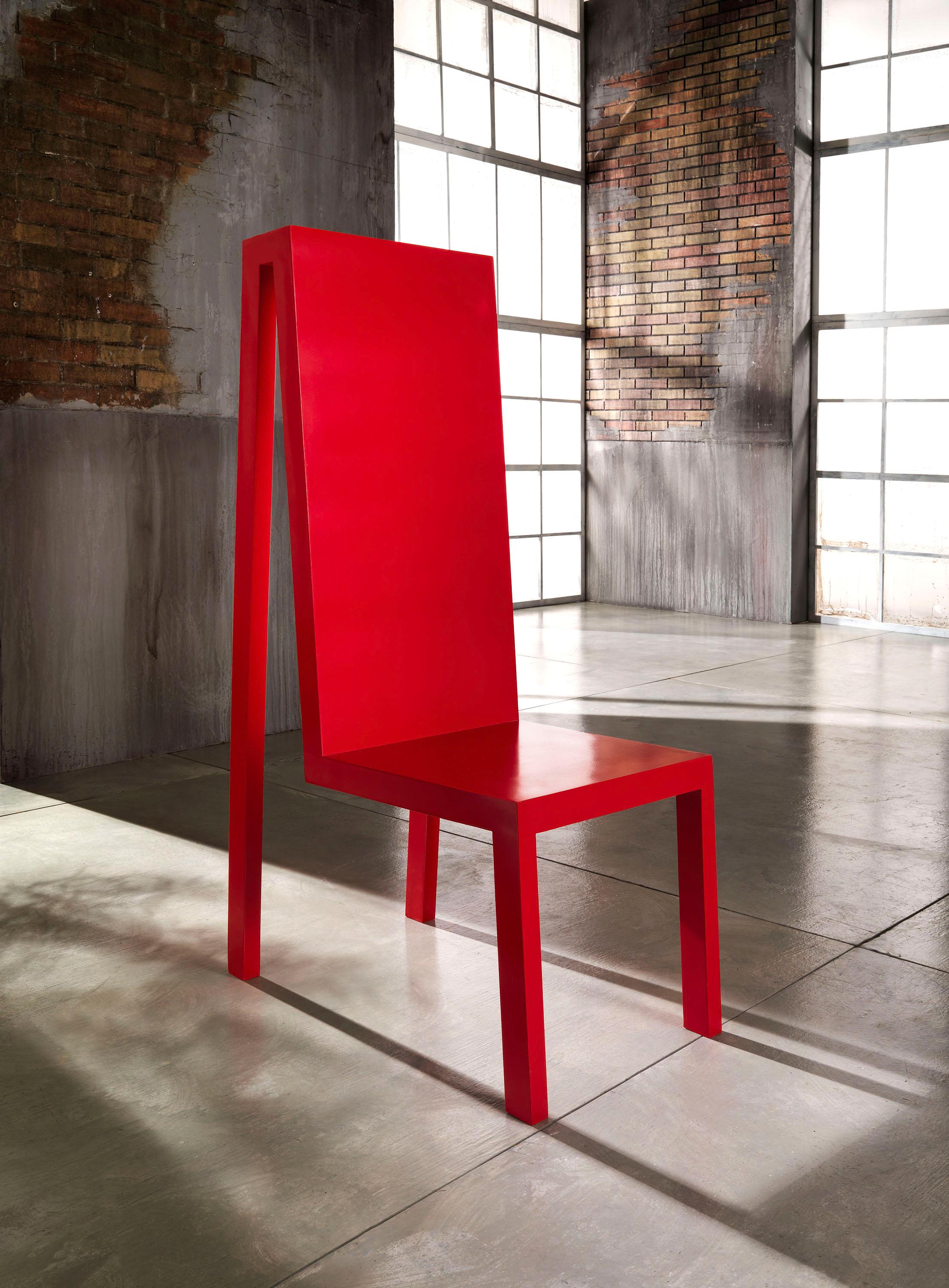 Exercice Rouge Chair by Francesco Profili
Dimensions: W 70 x D 45x H 127 cm 
Materials: Iron, Wood.

Form and color are combined in an unique design vision.
An involved artisanal production method, which avoids the use of junctures, realises a chair