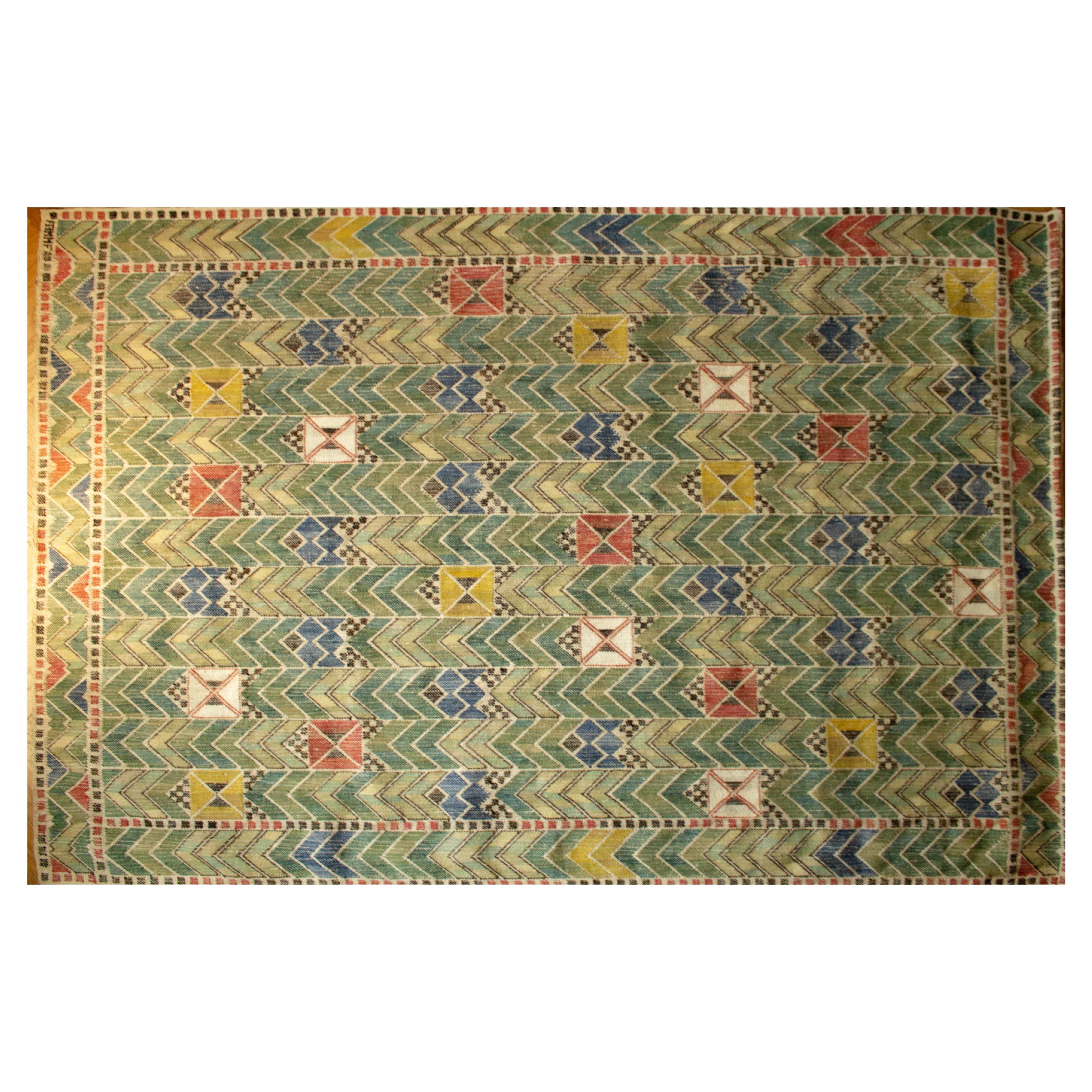 Exhibited, vintage wall tapestry by one of the most famous Swedish designers Märta Måås-Fjetterström. Made at her studio in the 1990s. The pattern 