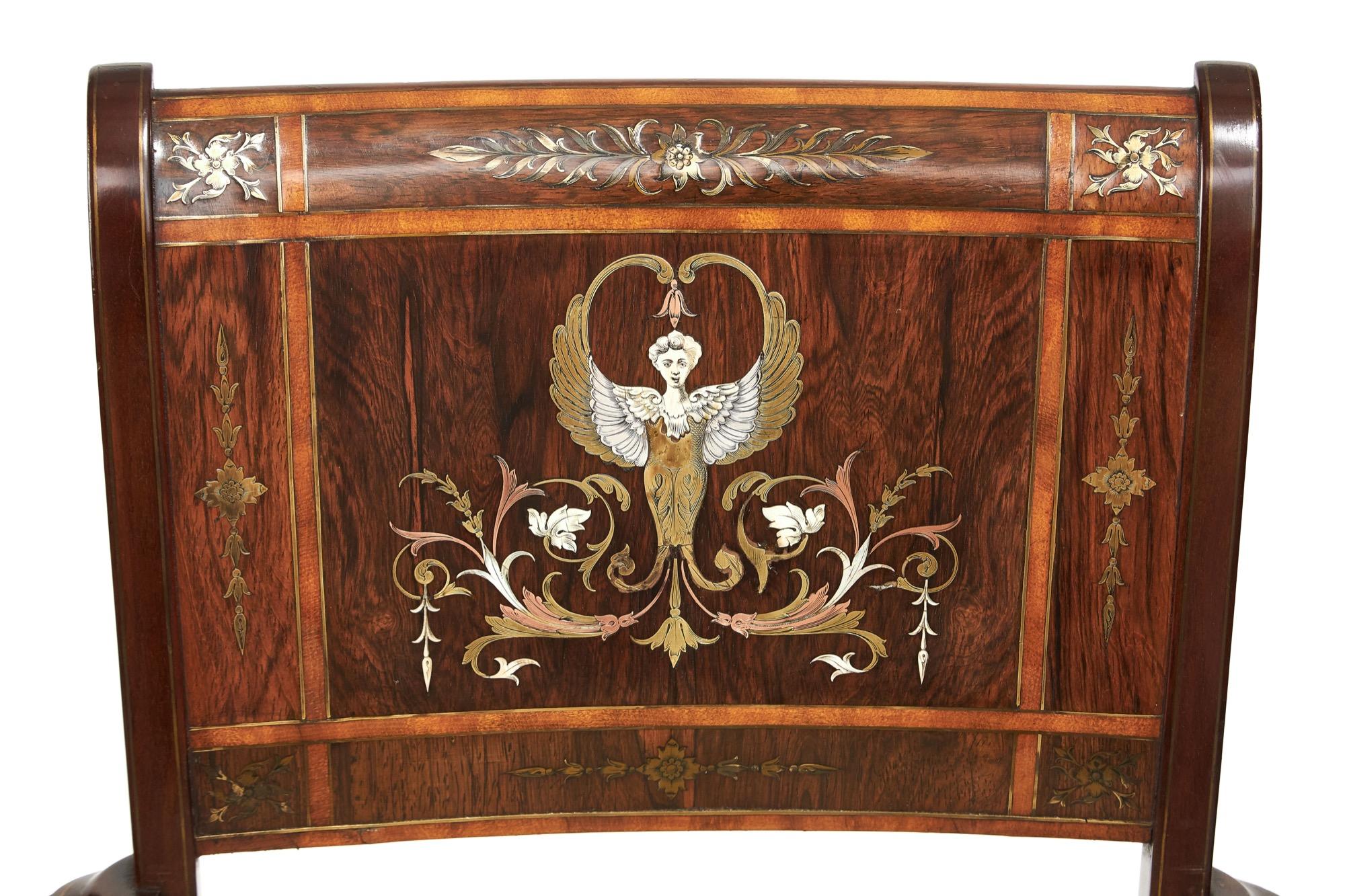 Exhibition quality antique Victorian brass inlaid elbow chair having magnificent fine brass, copper and bone inlay depicting a delightful angel, flowers and foliage and boasting brass inlay to each side, pretty shaped open arms with brass inlay to