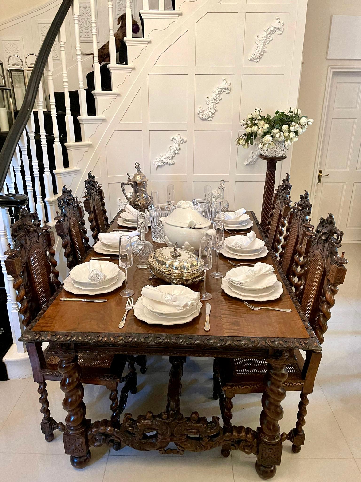 Magnificent exhibition quality antique Victorian Italian profusely carved solid walnut set of eight dining chairs consisting of a pair of throne armchairs and six single chairs having exhibition quality carved solid walnut backs with carved animals,