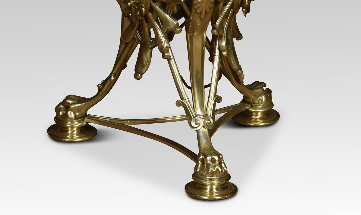 Exhibition quality standard lamp, the central adjustable brass column above the base having three maiden headed stems above tapering legs terminating in paw feet.
Dimensions:
Height 58 inches when fully extended 72.5 Inches
Width 16 inches
Depth