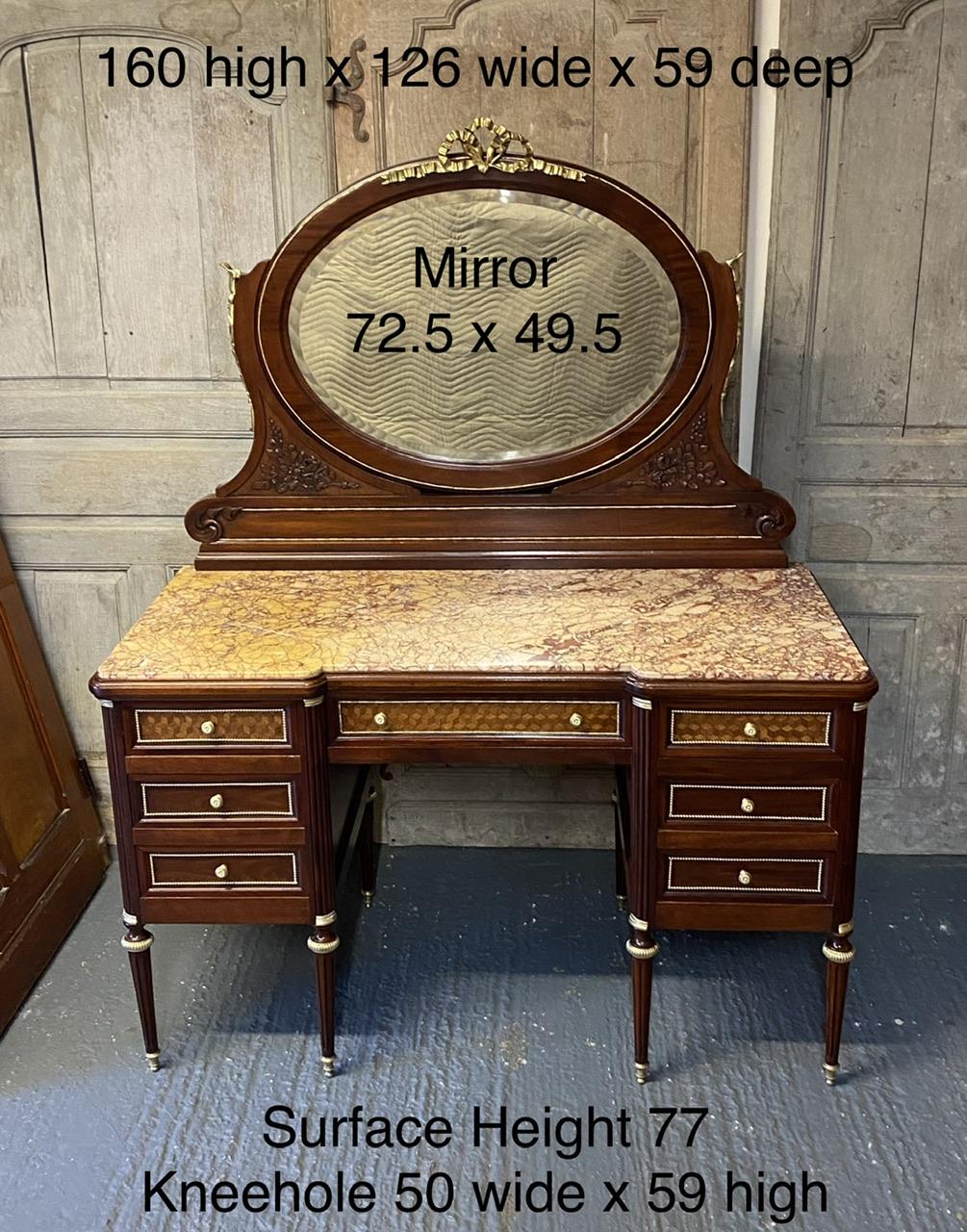 We are pleased to offer this extremely fine quality French Dressing Table. Dating to the 19th Century and of very good quality construction and craftsmanship as can be seen in the drawer dovetails. The original variegated marble top is in excellent