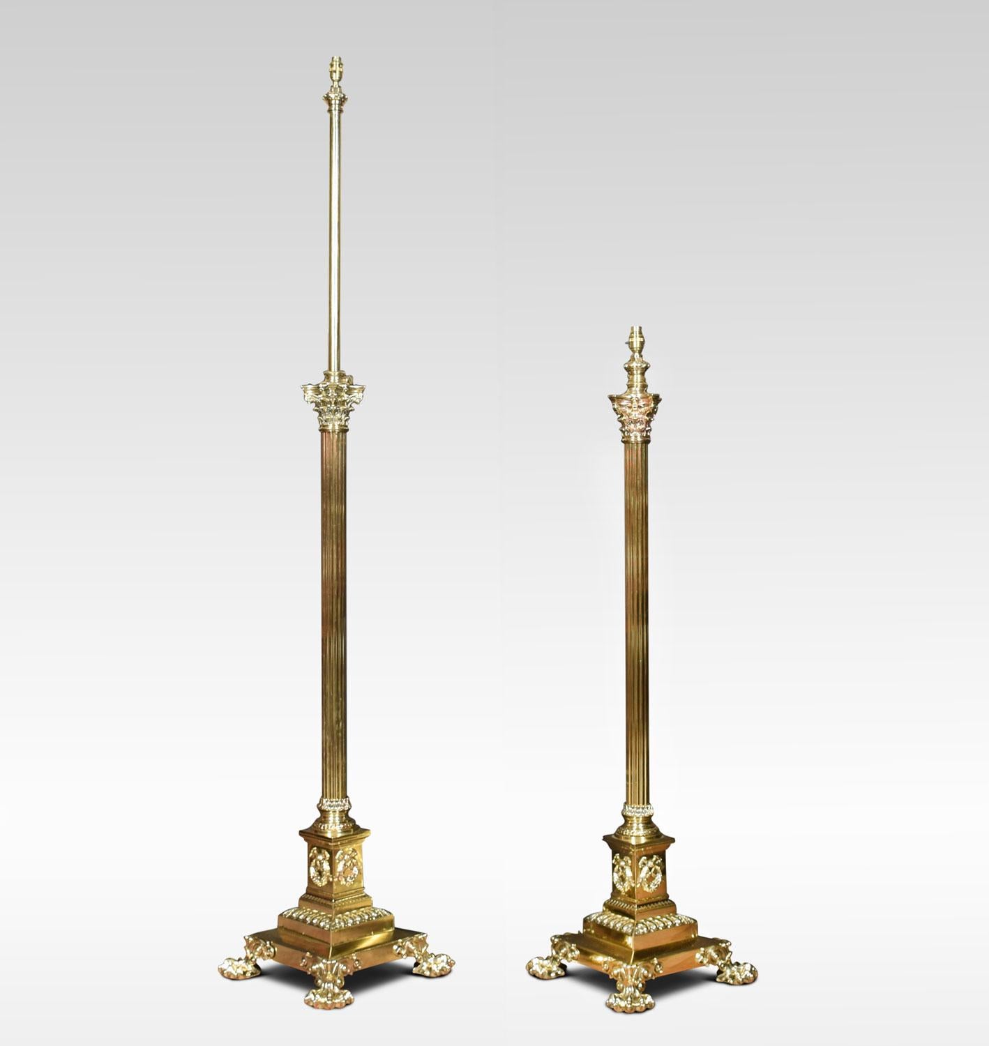 Pair of exhibition quality Victorian brass standard lamps. Having Corinthian column and adjustable stem, on large stepped square base with paw feet. The lamps have been rewired.
Dimensions:
Height 54 inches adjustable
Width 15 inches
Depth 15