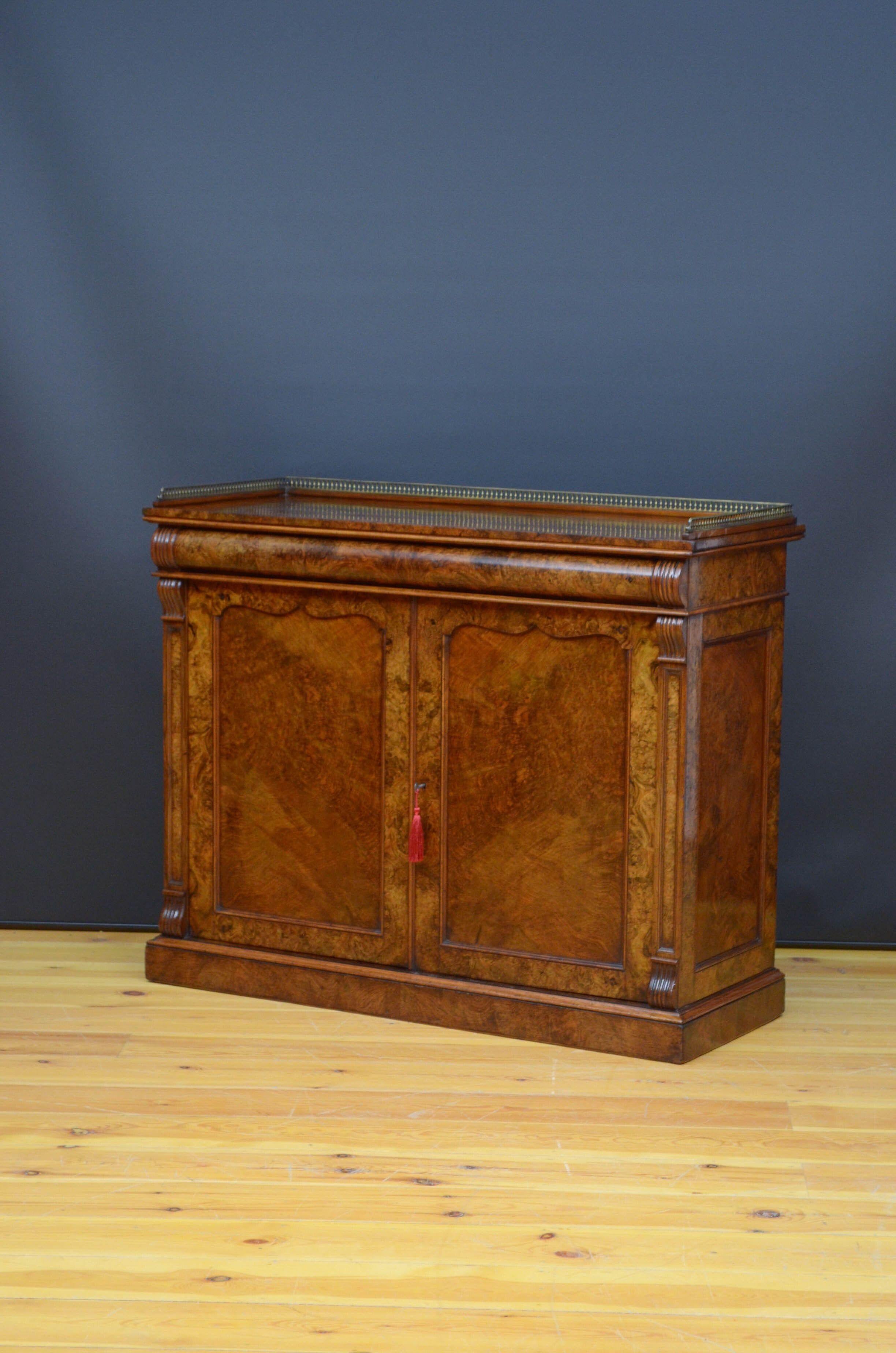Sn5243 Superior quality Victorian burr walnut chiffonier, having original brass gallery, book matched veneered top and cylindrical drawer with reeded ends above a pair of panelled doors fitted with original working lock and a key enclosing two