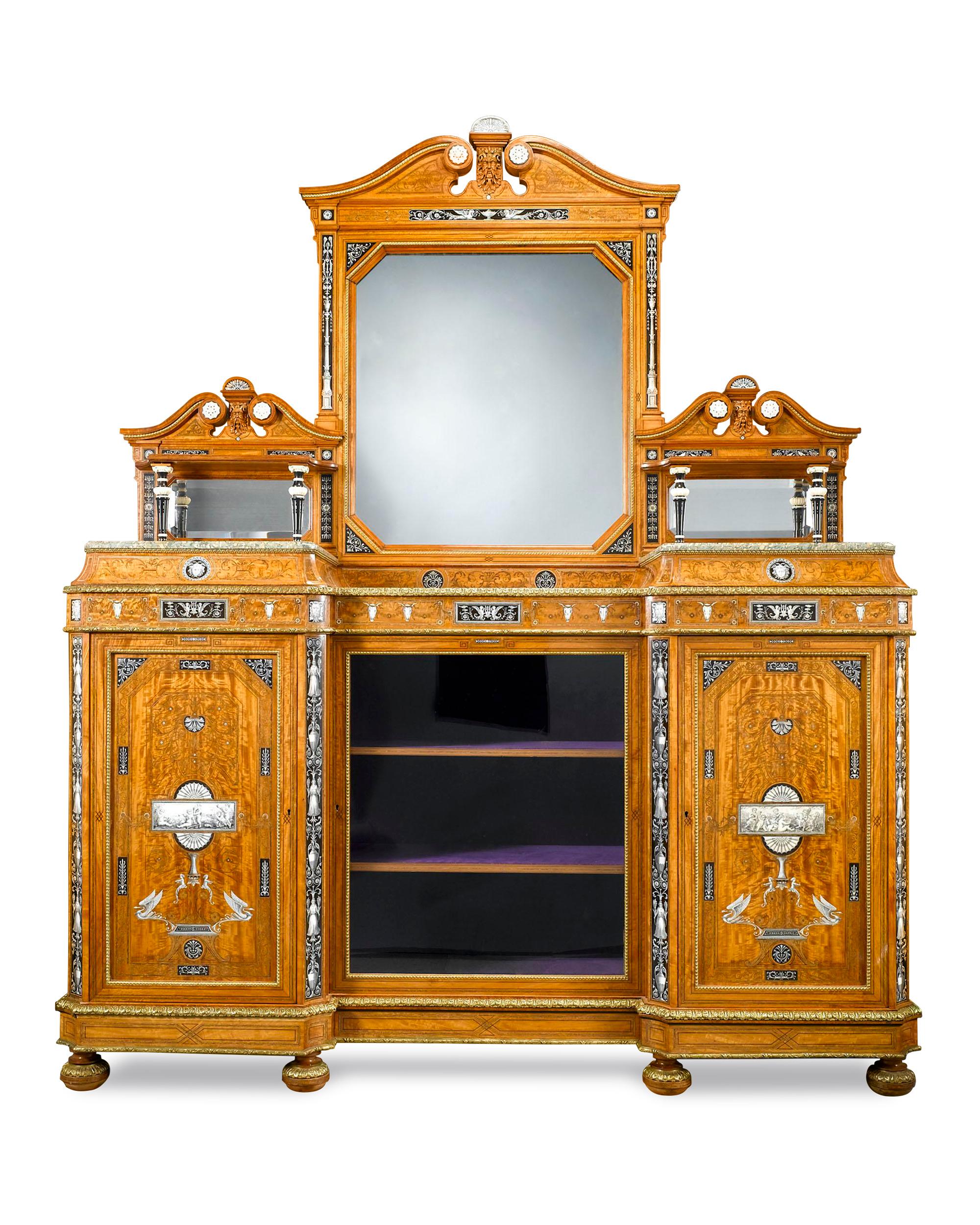 This extraordinary sideboard is attributed to the famed Wright and Mansfield and was only certainly created specifically for the important 19th century international exhibitions. Satinwood, ebony, marble and doré bronze of superior quality, are