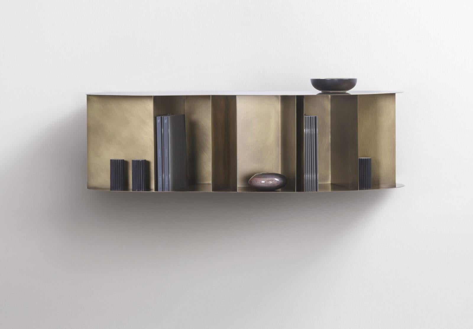 Existence Console by De Castelli
Dimensions: W 124 x D 37 x H 41 cm
Materials: Orbitale DeLabré Brass
Stainless Steel and Copper versions are available. Please contact us for any requests.

Available in wall-mounted versions, Existence consolle