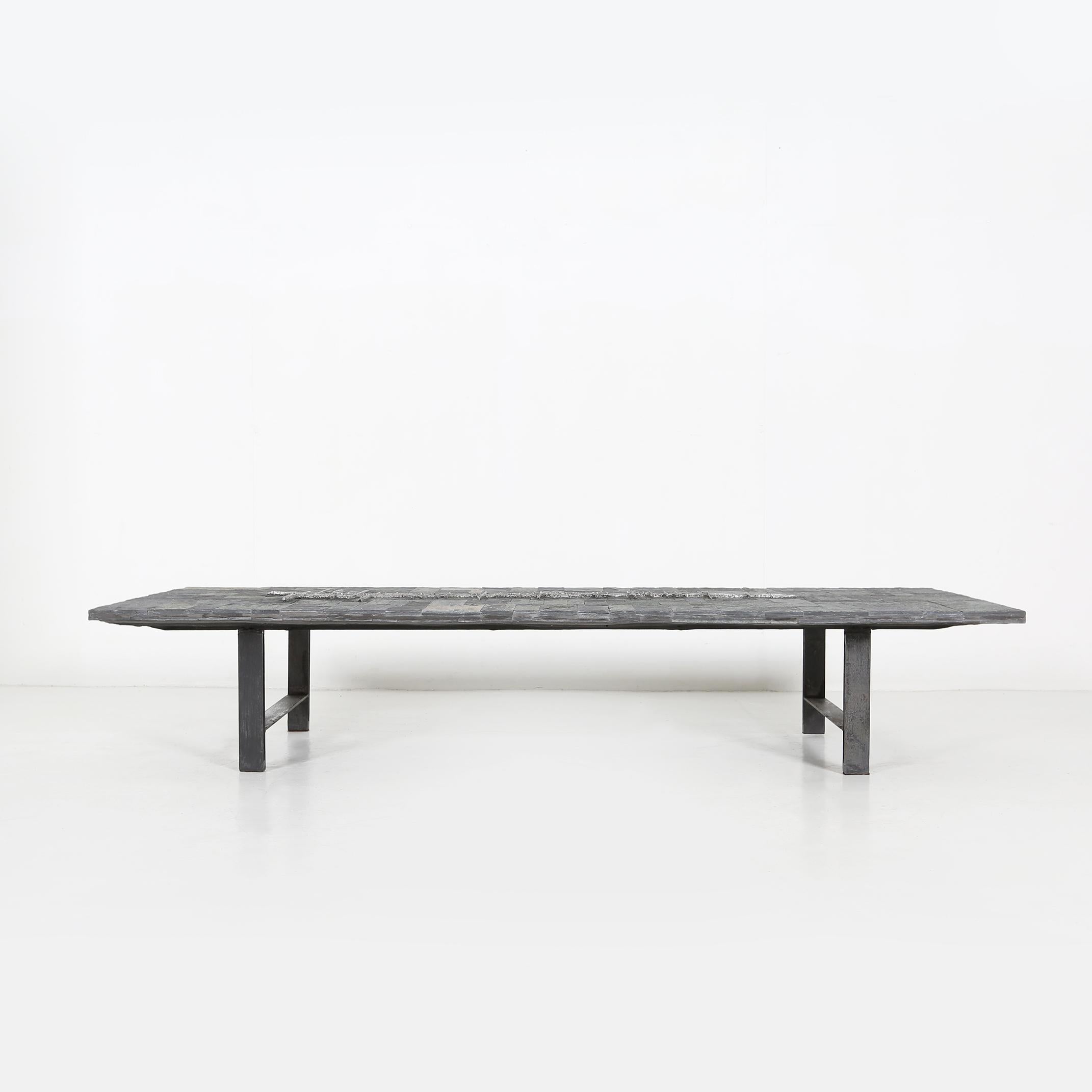Very rare coffee table made by Belgian artist Pia Manu.
Made of brazilian slate stone and a rebar steel base.
The table has a very brutalist look and the slate stone has a sparkle.