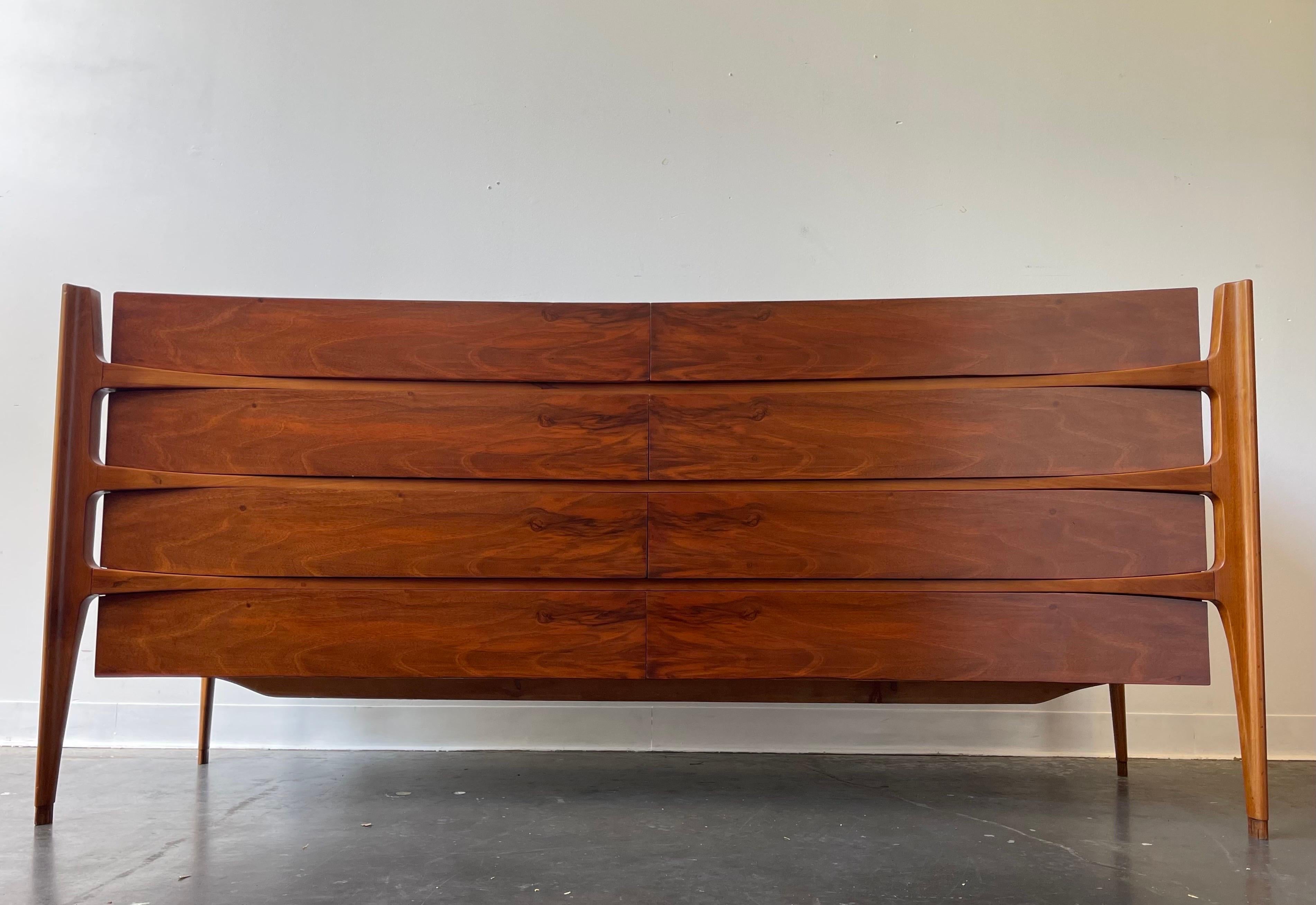 Stunning sculptural lowboy dresser in the style of William Hinn designed by Iorgen Clausen for Brande Mobelfabrik DEnmark circa 1960’s.

This is an exact design as the Hinn dresser but the quality is actually superior in many opinions.

8 drawer