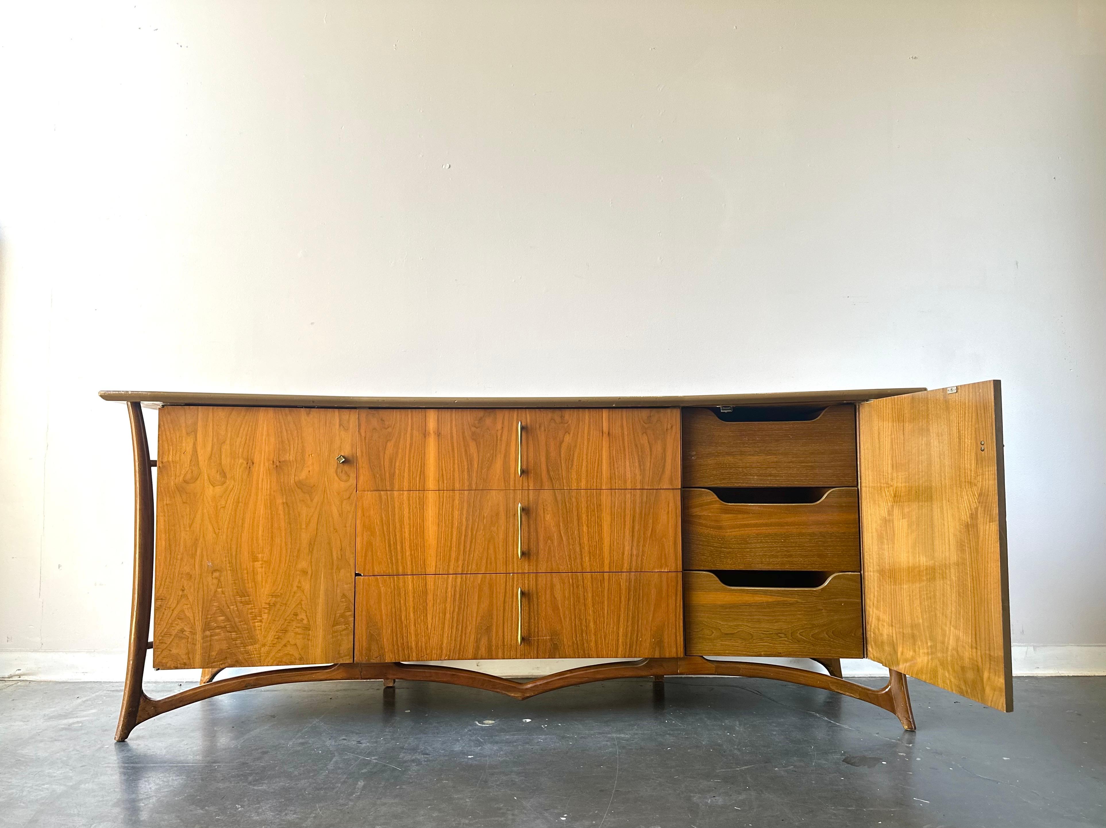 Piet Hein designed walnut exoskeleton style dresser.

Gorgeous piece that’s in great shape!
Nine drawers, floating frame, and loads of character.

Dimensions are 80”W x 19.5”D x 34”H