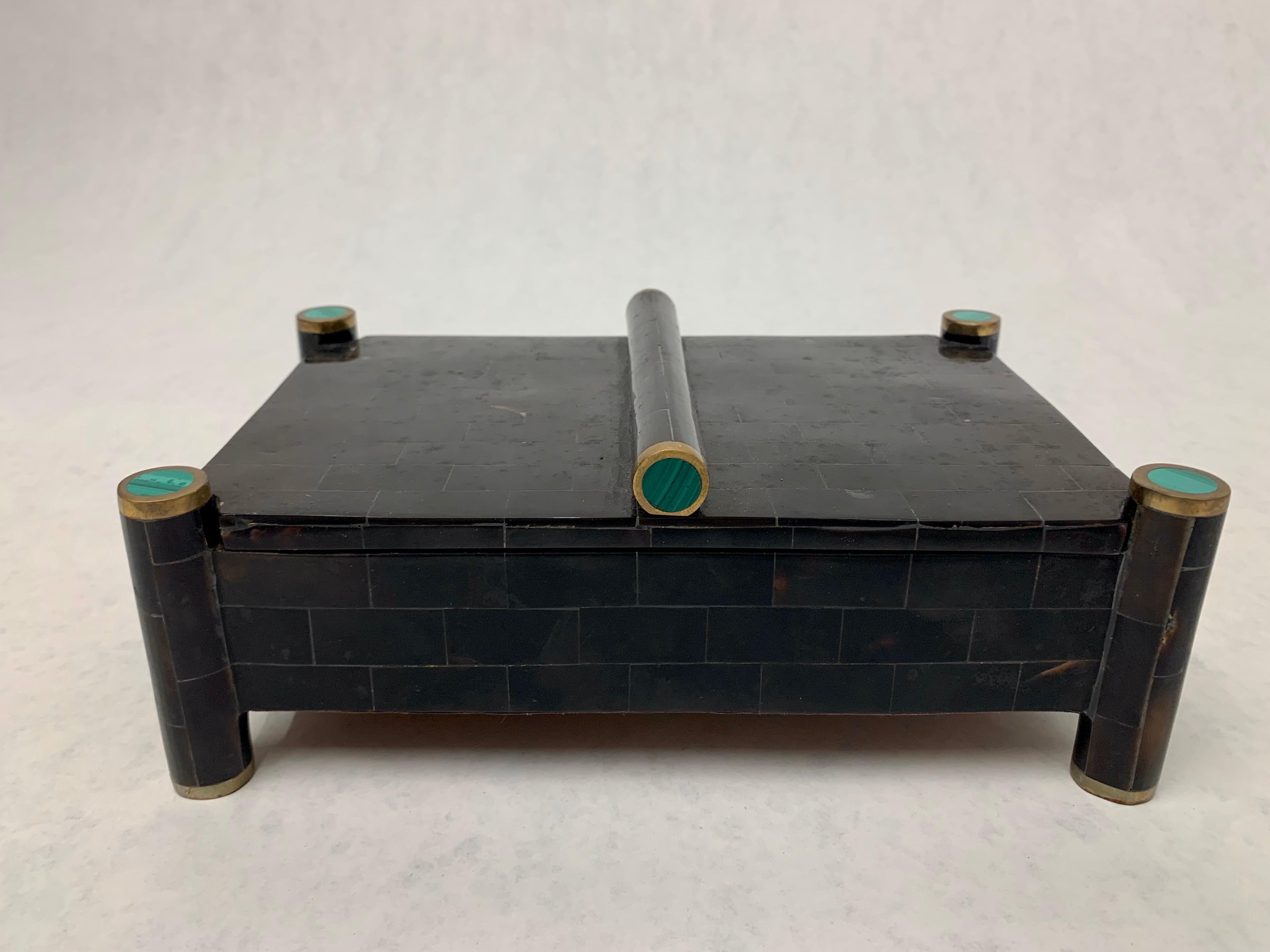 Beautiful decorative box lined to interior with mahogany and exterior with tessellated Horn. Accents of malachite and brass. Lovely for anywhere.