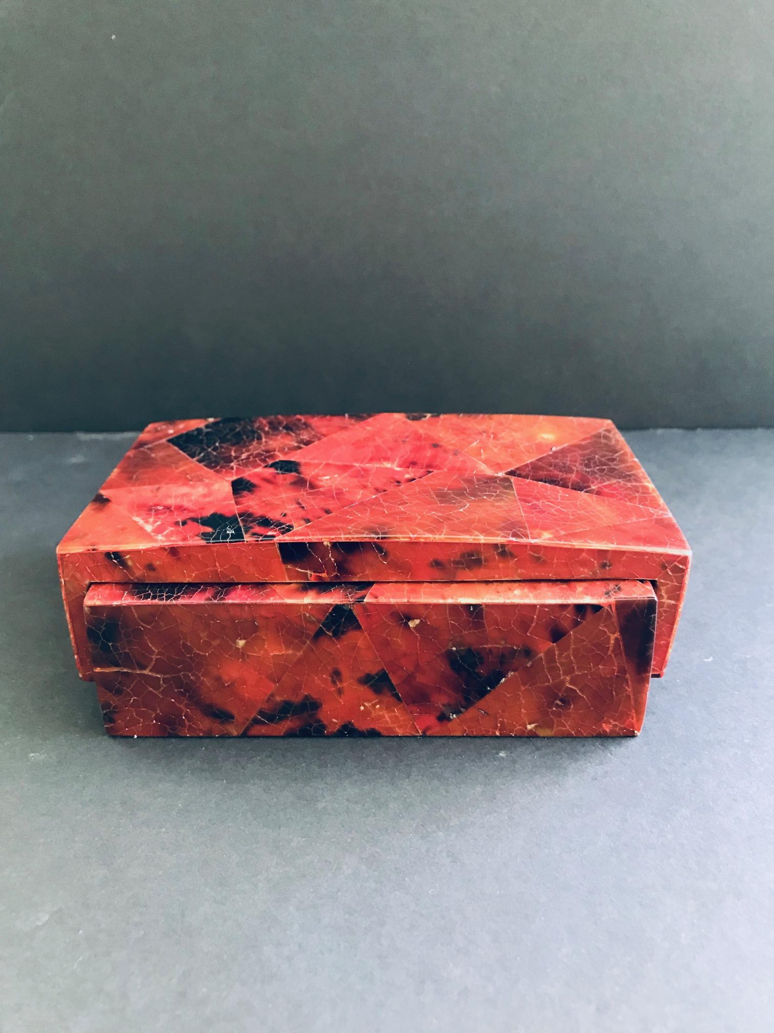 Organic Modern box or desk accessory in lacquered pen-shell. Hand-dyed in red and black with mosaic inlays throughout. Box features overlapping waterfall lid design with handcrafted palmwood interior. Signed R&Y Augousti on underside. Other matching