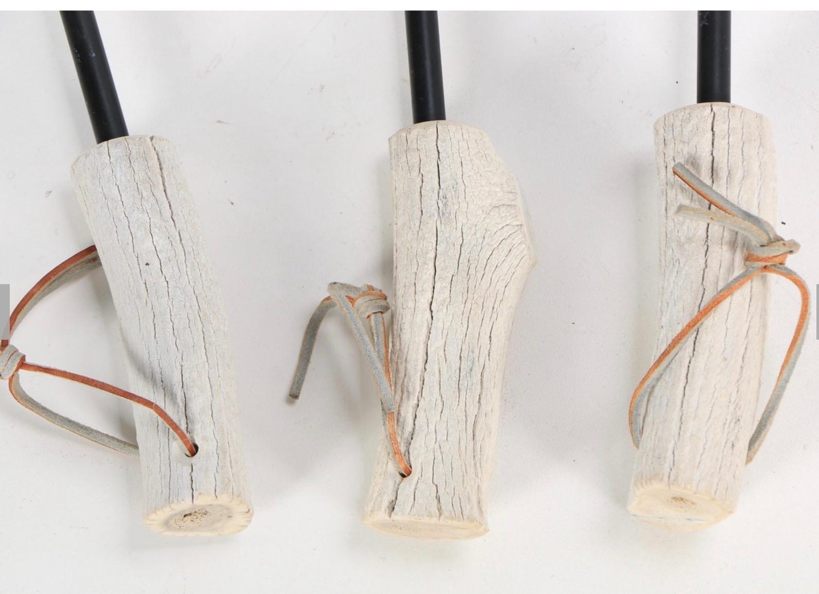 A one-of-a-kind exotic set of organic natural antler 3-piece fireplace tools hanging by rawhide straps on  the cleverly custom matching cast faux antler stand- To Light Your Fire in Style!
A 'WOW' fireplace set for your fireplace