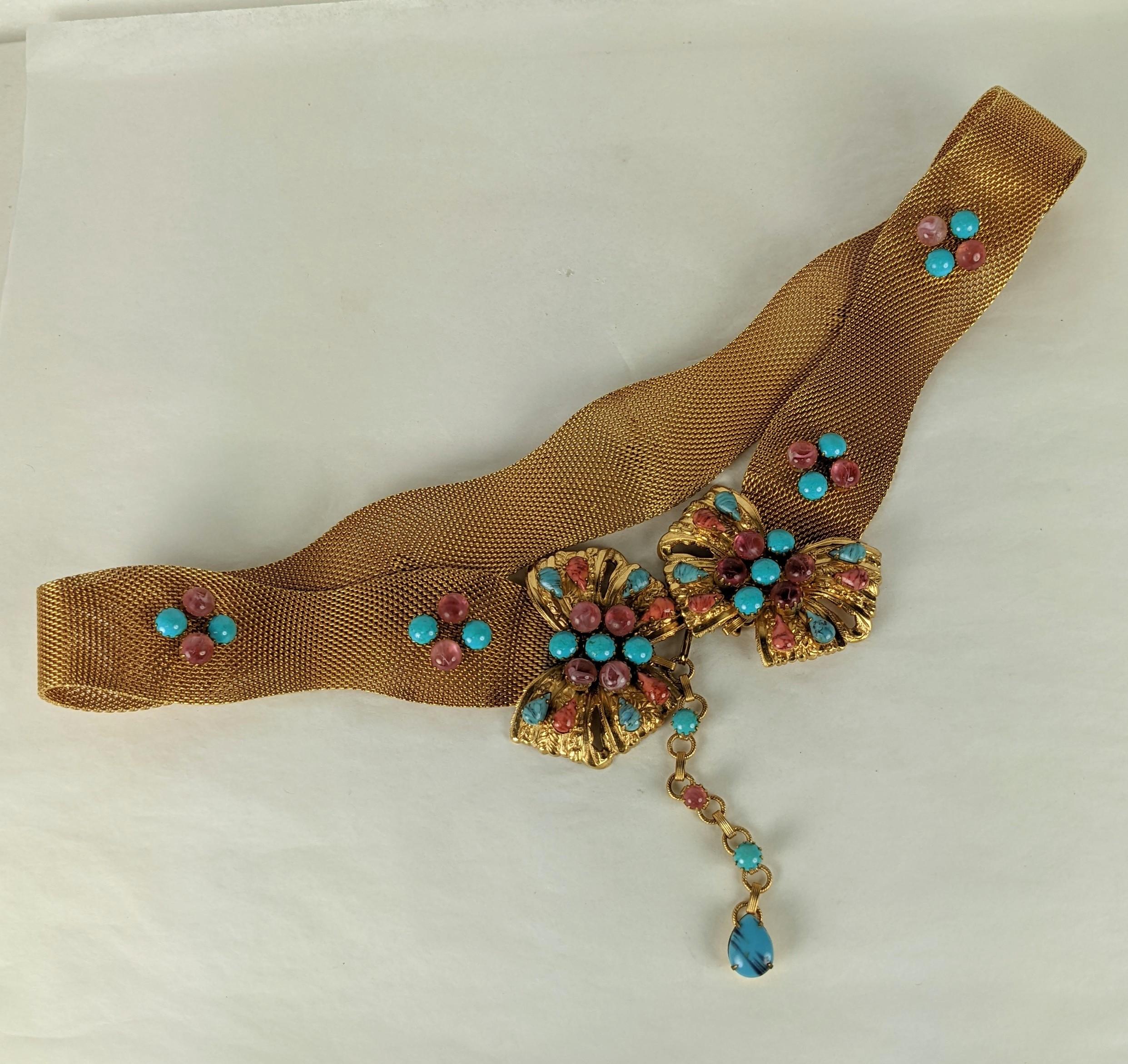 Exotic and striking Jeweled Belt from the 1960's by Original by Robert. Unusual wavy gold mesh chaining is set with pronged stones in pink and faux turquoise with the addition of round cabs in real turquoise. Perfect to upgrade a simple shirt dress
