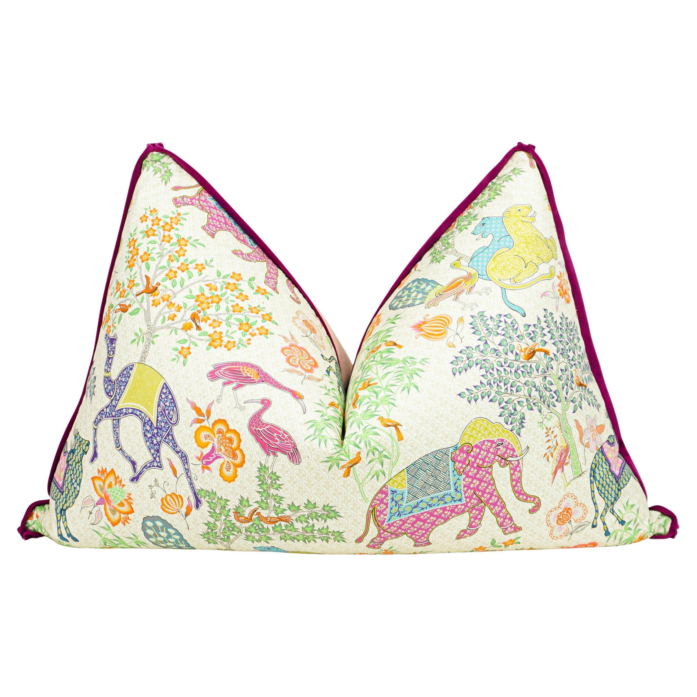 Playful printed cotton featuring elephant, camel, lion and emu. Lush berry velvet flange and medium pink silky velvet back. Made with invisible zipper and custom down/feather insert. Price per pillow.

Measurements:
Overall: 40”W x 12”D x