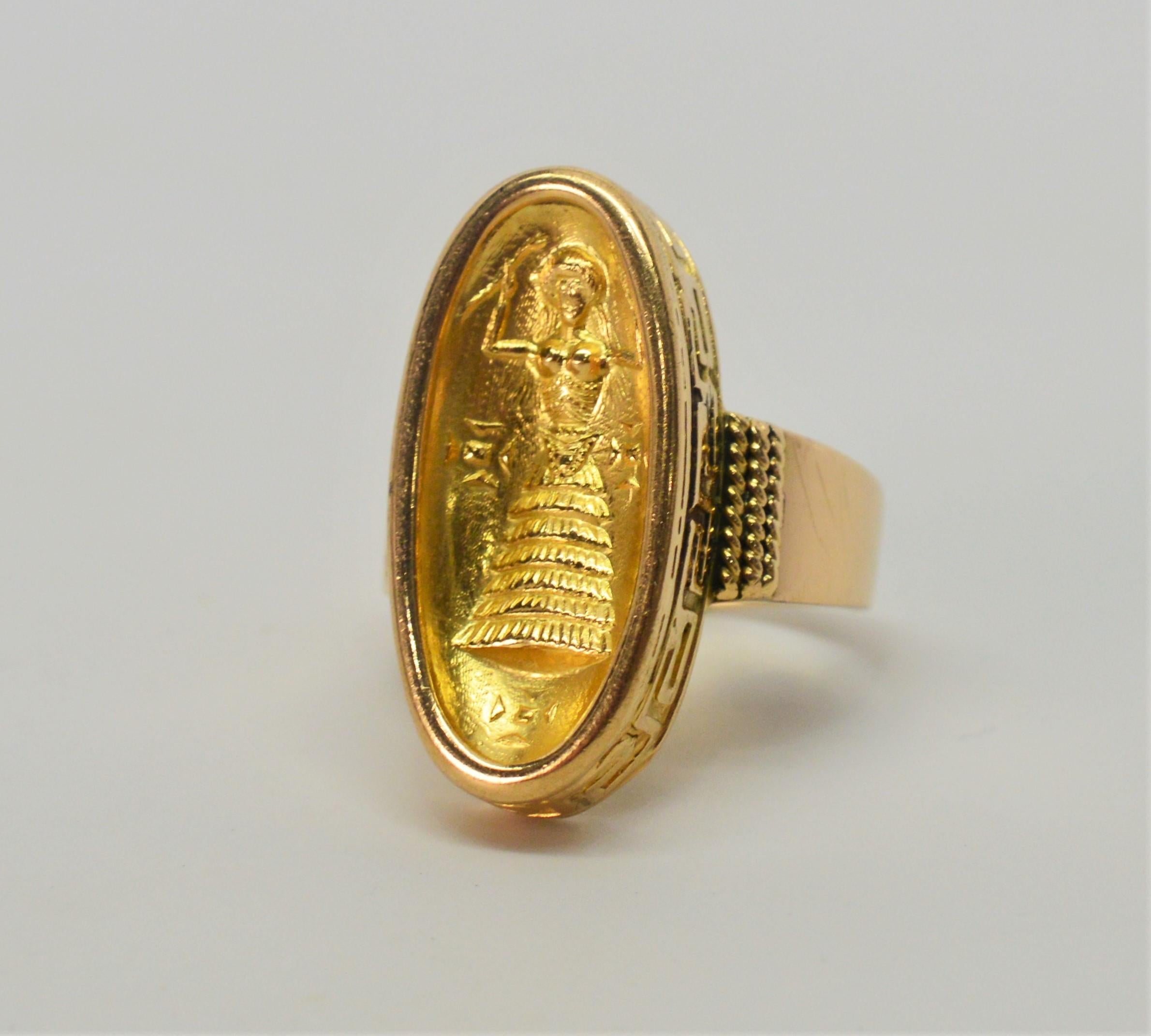 Feel empowered wearing this unique fourteen carat yellow gold exotic princess ring. She's a bold beauty, measuring 1 inch tall x 1/2 inch wide and 1/4 inch deep. In ring size 8-1/4 and can be resized by your jeweler.