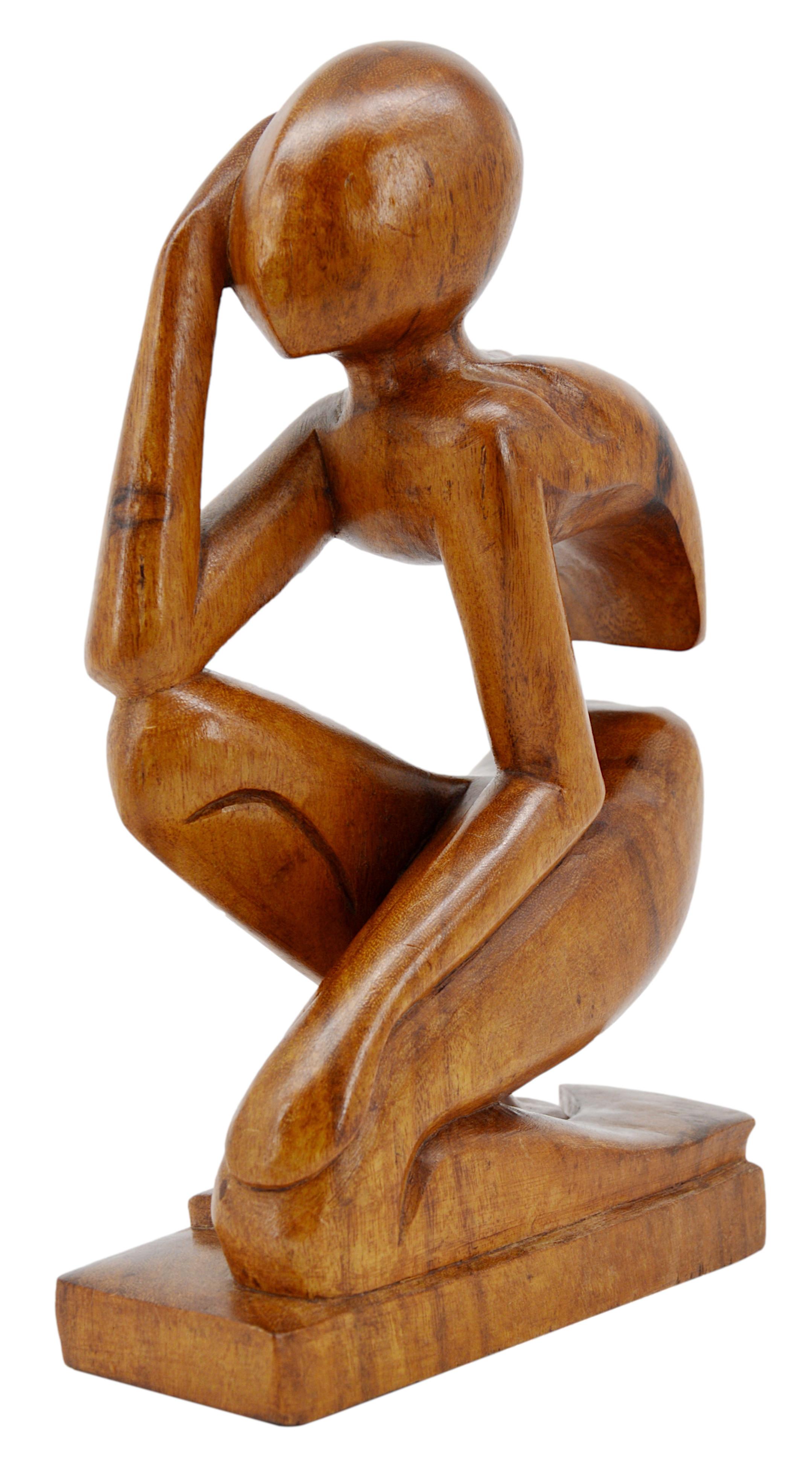 Exotic thinker man sculpture, 1950-1970. Wooden sculpture of a thinker man. The model underlines harmonious and supple curves. Measures: Height: 11.8