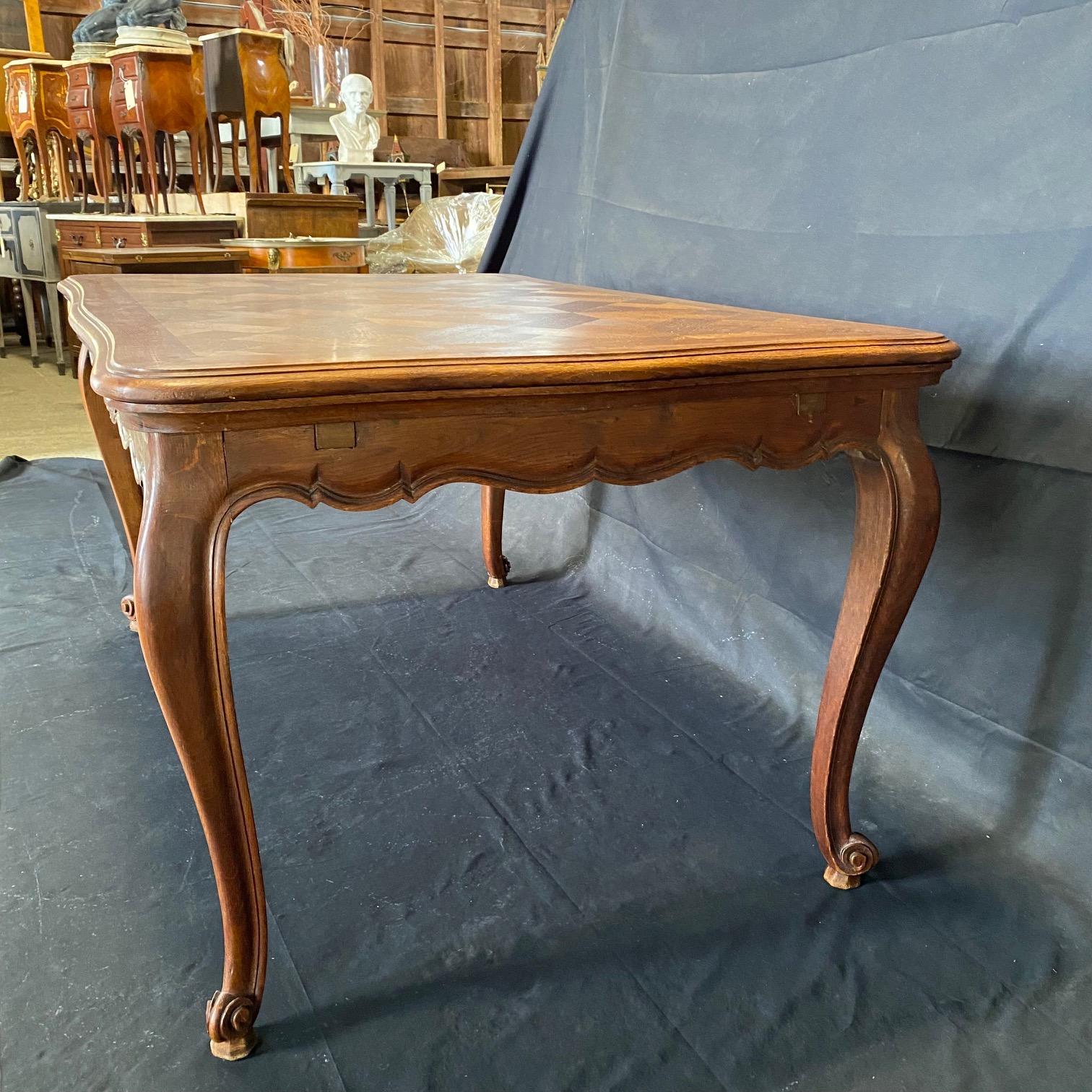 Parquetry Expandable 19th Century French Louis XV Carved Dining Table with Two Leaves For Sale