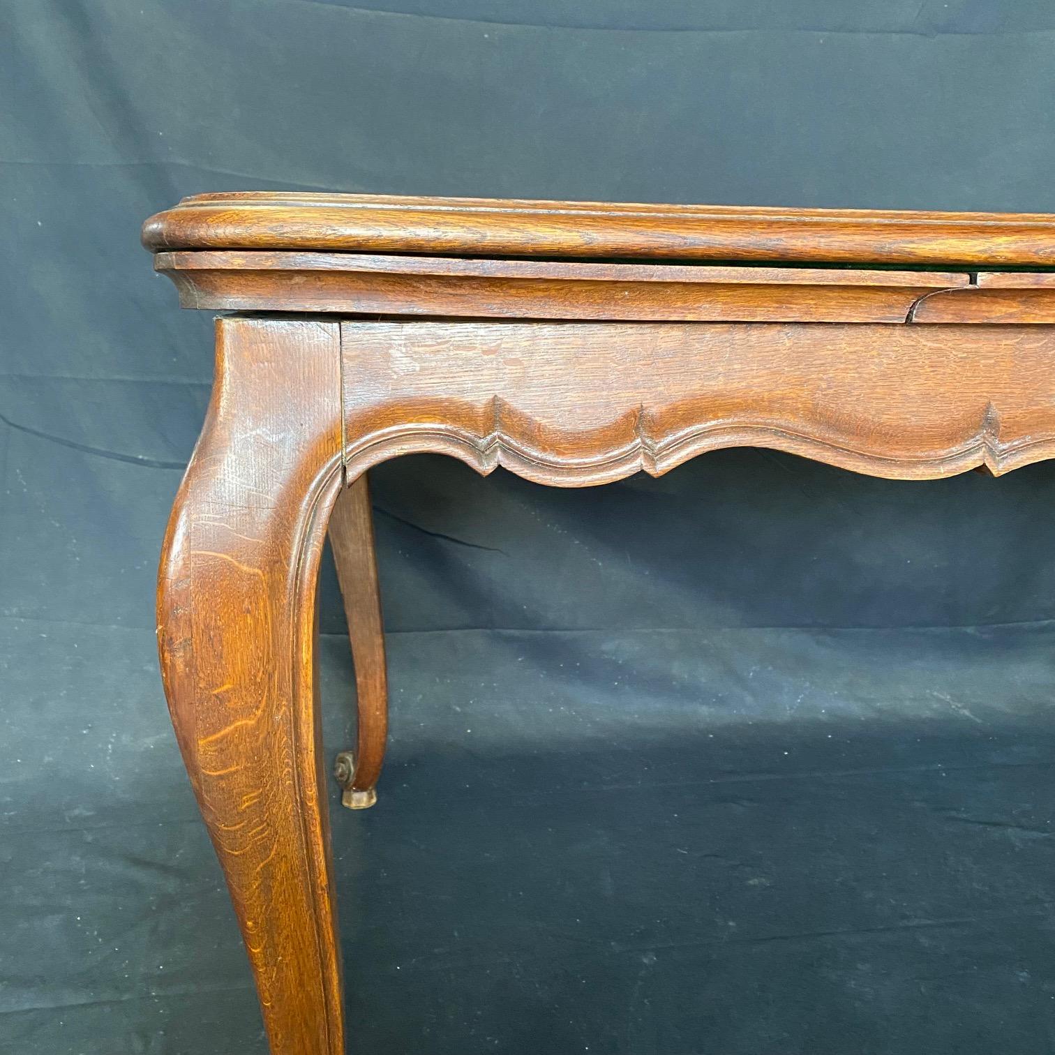 Oak Expandable 19th Century French Louis XV Carved Dining Table with Two Leaves For Sale