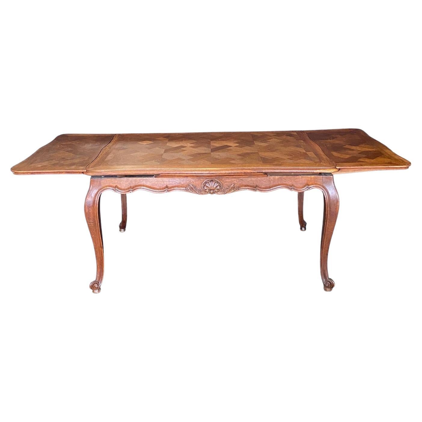 Expandable 19th Century French Louis XV Carved Dining Table with Two Leaves