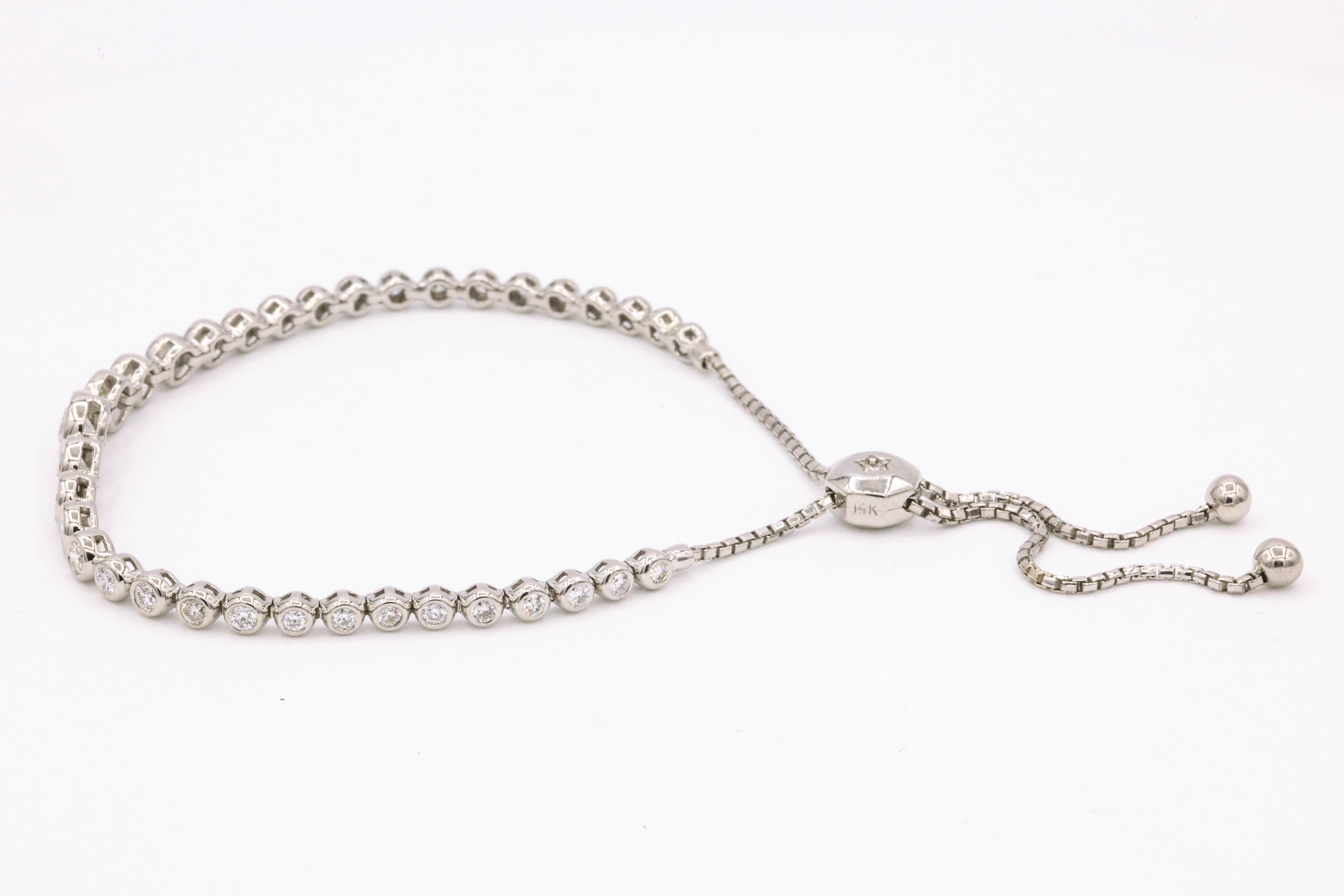 Diamond bezel bracelet featuring 2.52 carats diamonds, in 14k white gold. 
Color G-H
Clarity SI 