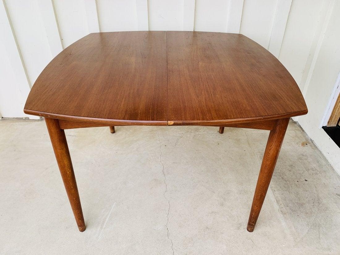 Danish dining table with 2 leaves that can be added as more space is needed, the table was made in Denmark, Designed and manufactured by O.C. Ausen Mobelfabrik.

The table is in vintage condition and may need to be refinished. The piece is made in