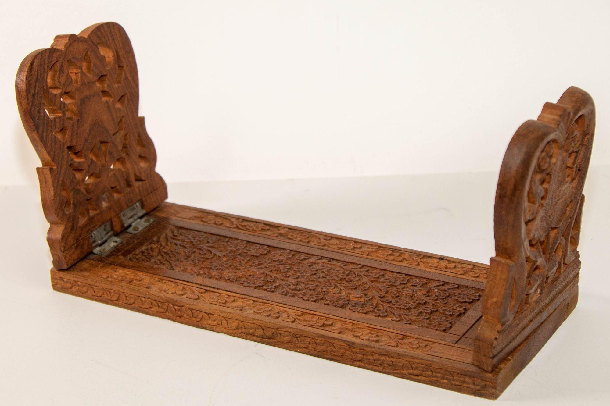 Expandable Book shelf hand carved teak wood book Bookends from India, circa 1950s.
Book holder from India intricately hand carved teak wood book rack holder and will expands to 20 inches.
Vintage wooden leaf book rack.
Boho style carved wood