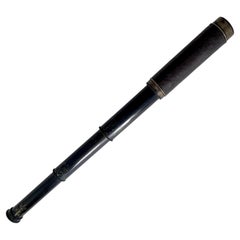 Used Expandable Metal Brass Telescope Wrapped in Leather with Silver Caps for Lens