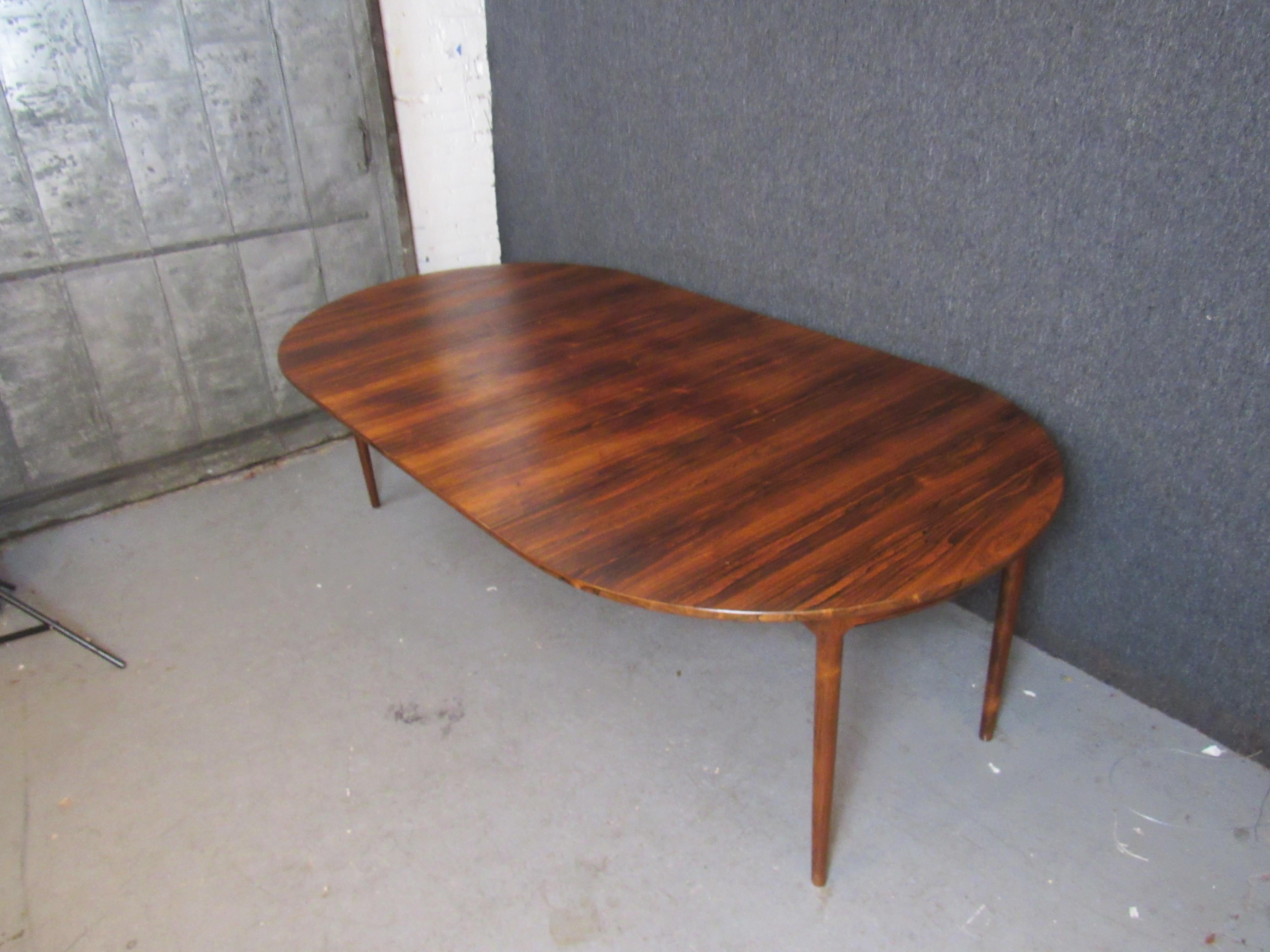 Mid-Century Modern Expandable Rosewood Dining Table by Ib Kofod-Larsen for Seffle For Sale