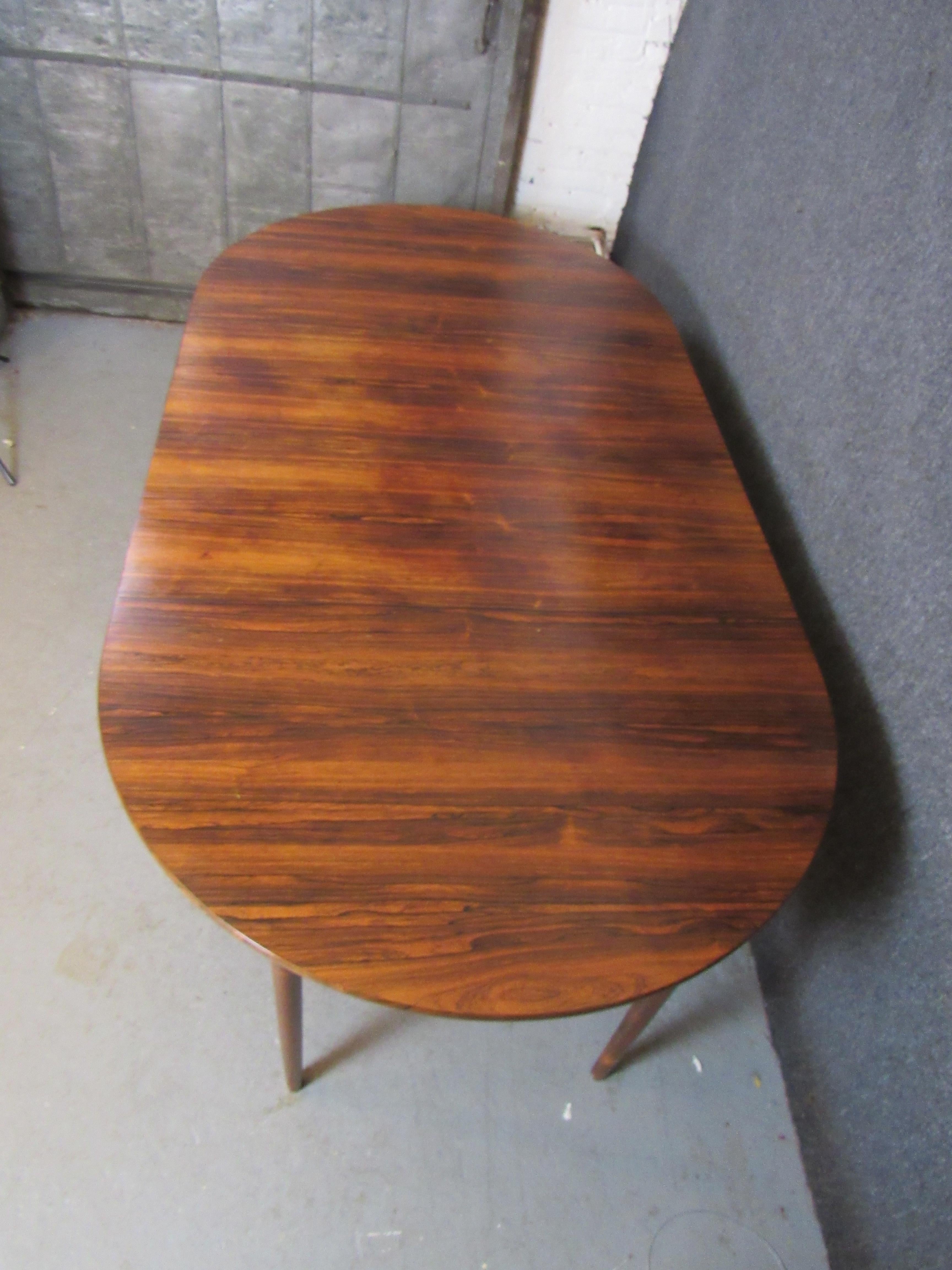 Swedish Expandable Rosewood Dining Table by Ib Kofod-Larsen for Seffle For Sale