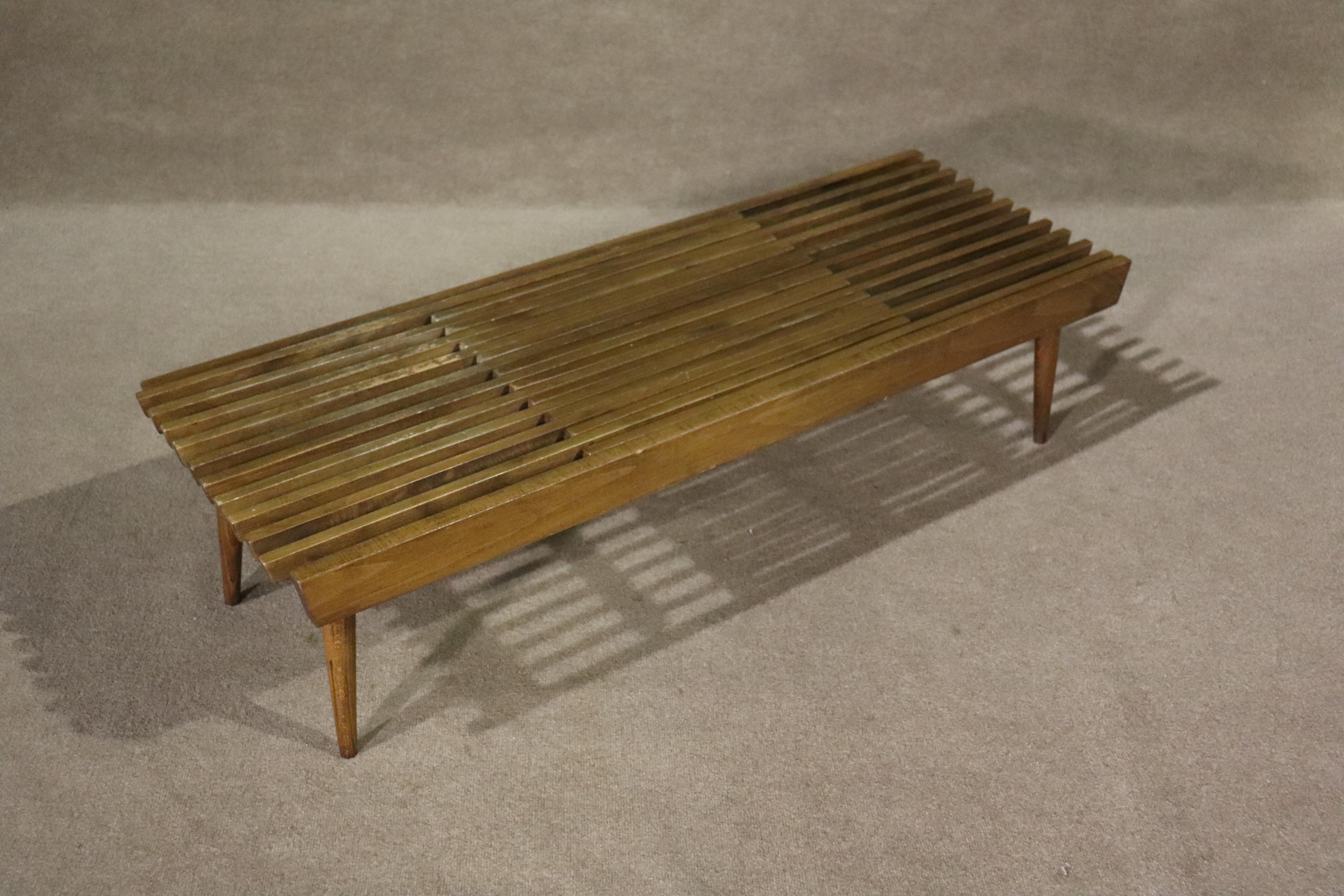 Mid-century modern slat table that extends with two sides. Can be used as a coffee table or entry bench.
Please confirm location NY or NJ