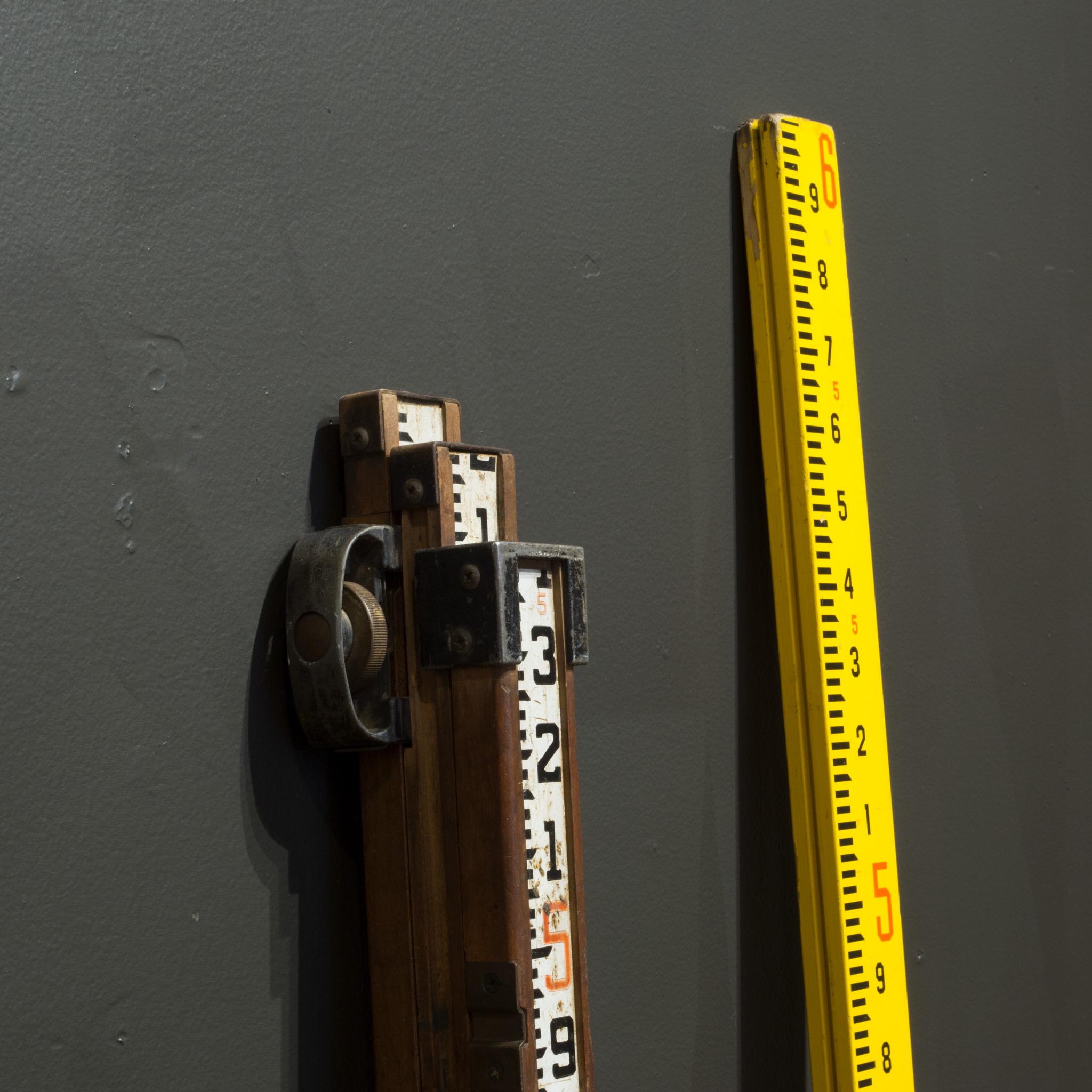 vintage surveyors measuring stick