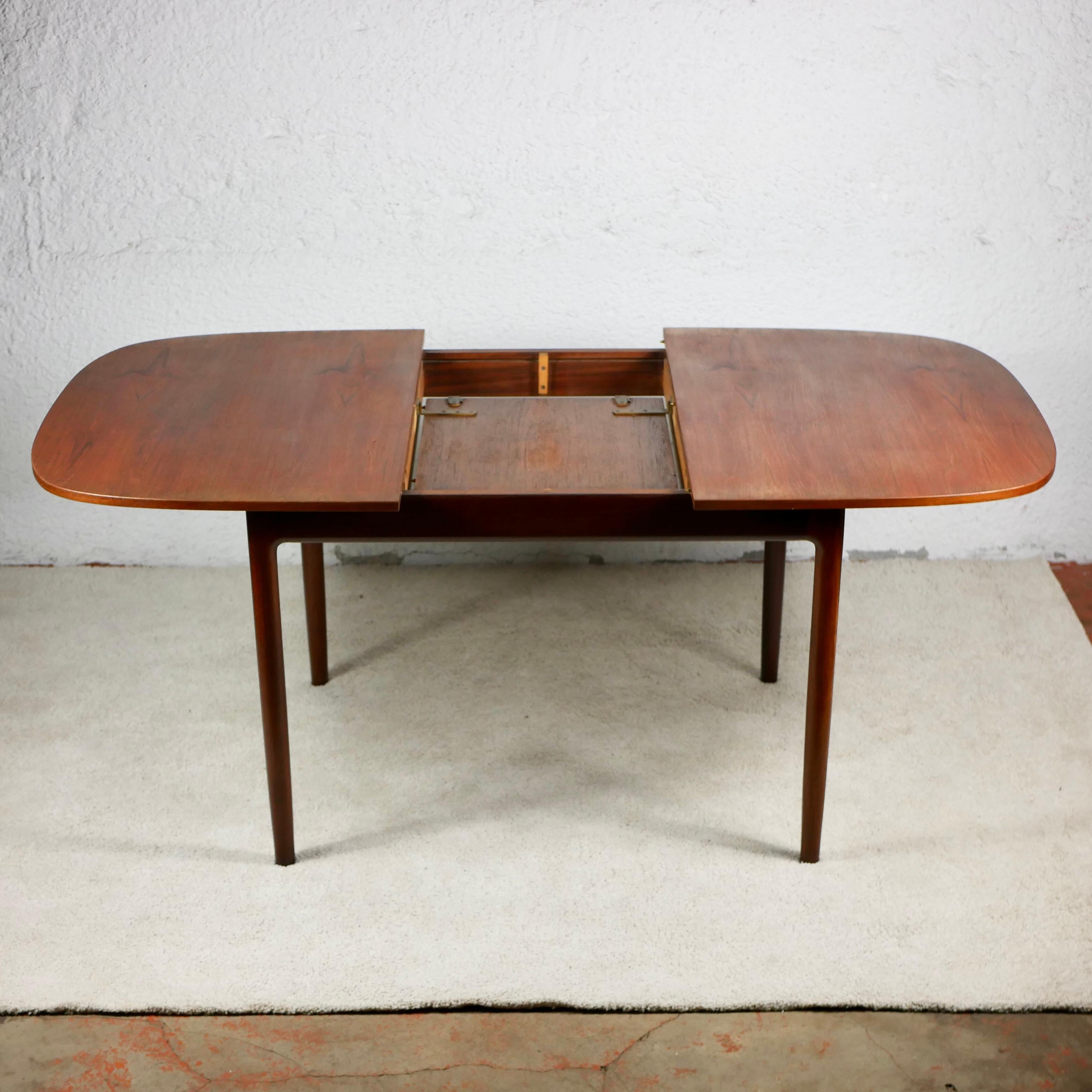 English Expandable teak dining table by Ib Kofod Larsen for G-plan, 1960s