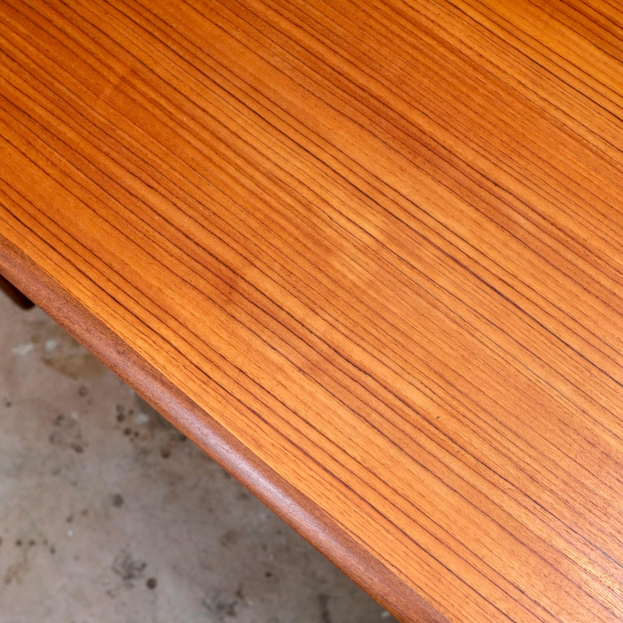 Expandable teak dining table by Johannes Andersen for Uldum Mobelfabrik, 1960s 10
