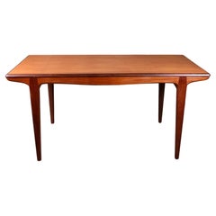 Expandable teak dining table by Johannes Andersen for Uldum Mobelfabrik, 1960s
