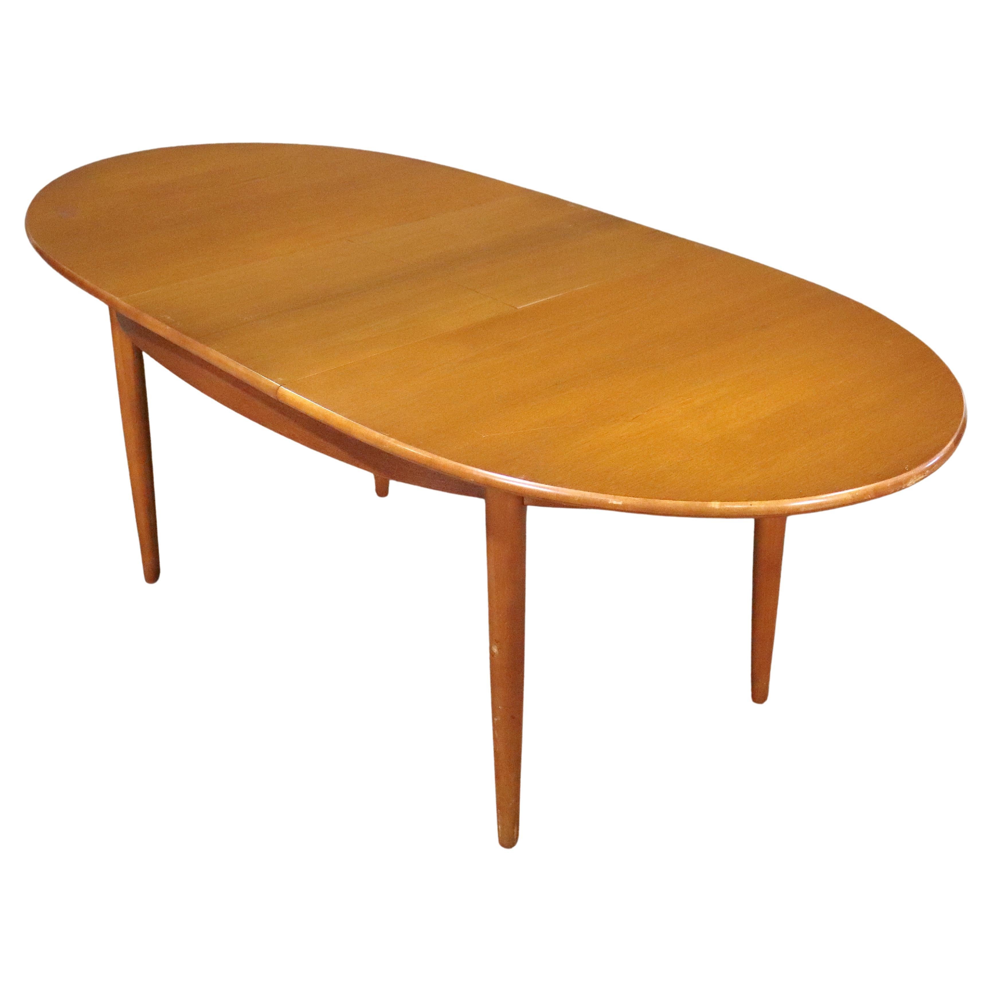 Table à manger danoise extensible avec feuille papillon