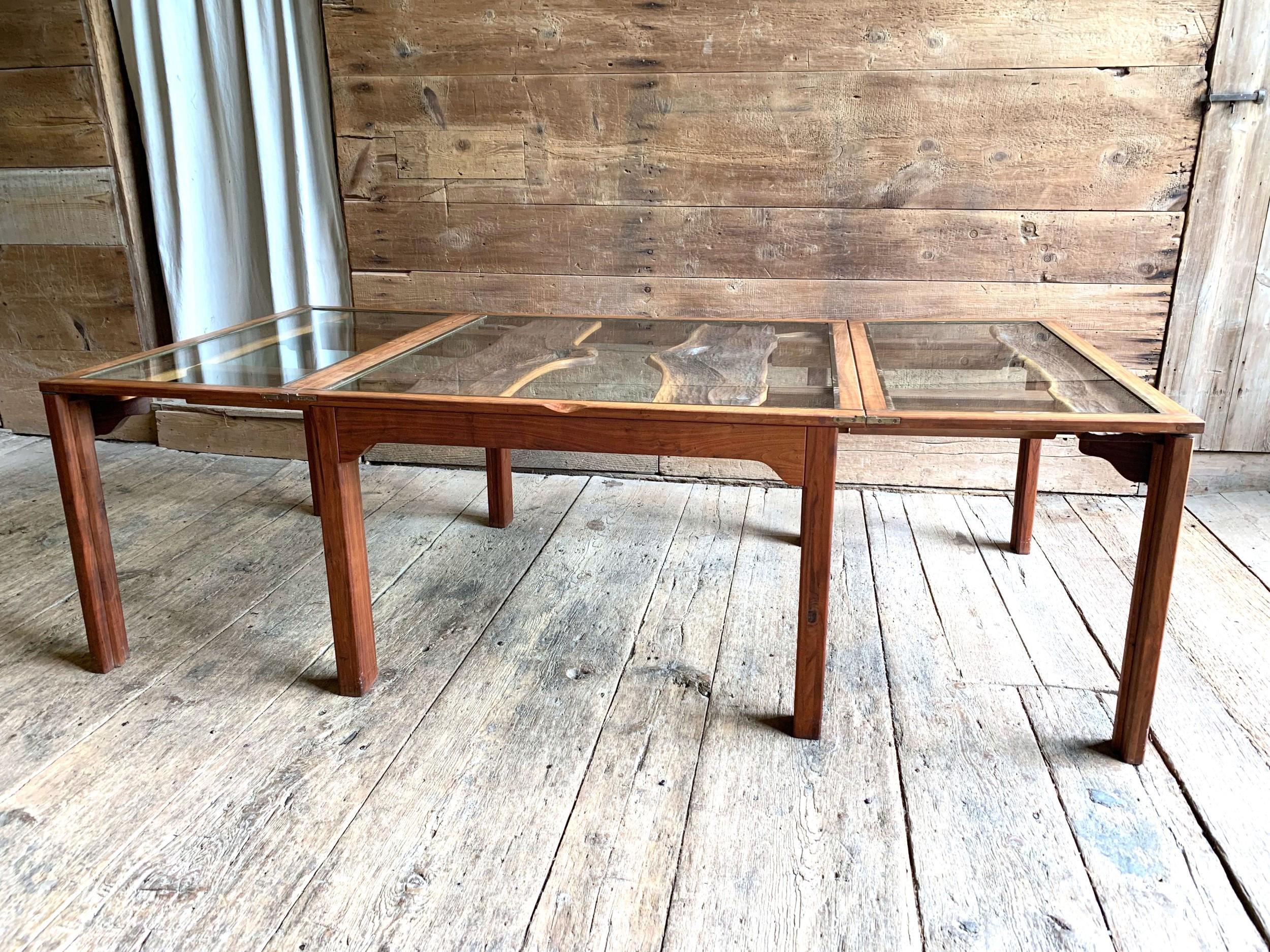 An important folding dining table by Phillip Lloyd Powell, with 