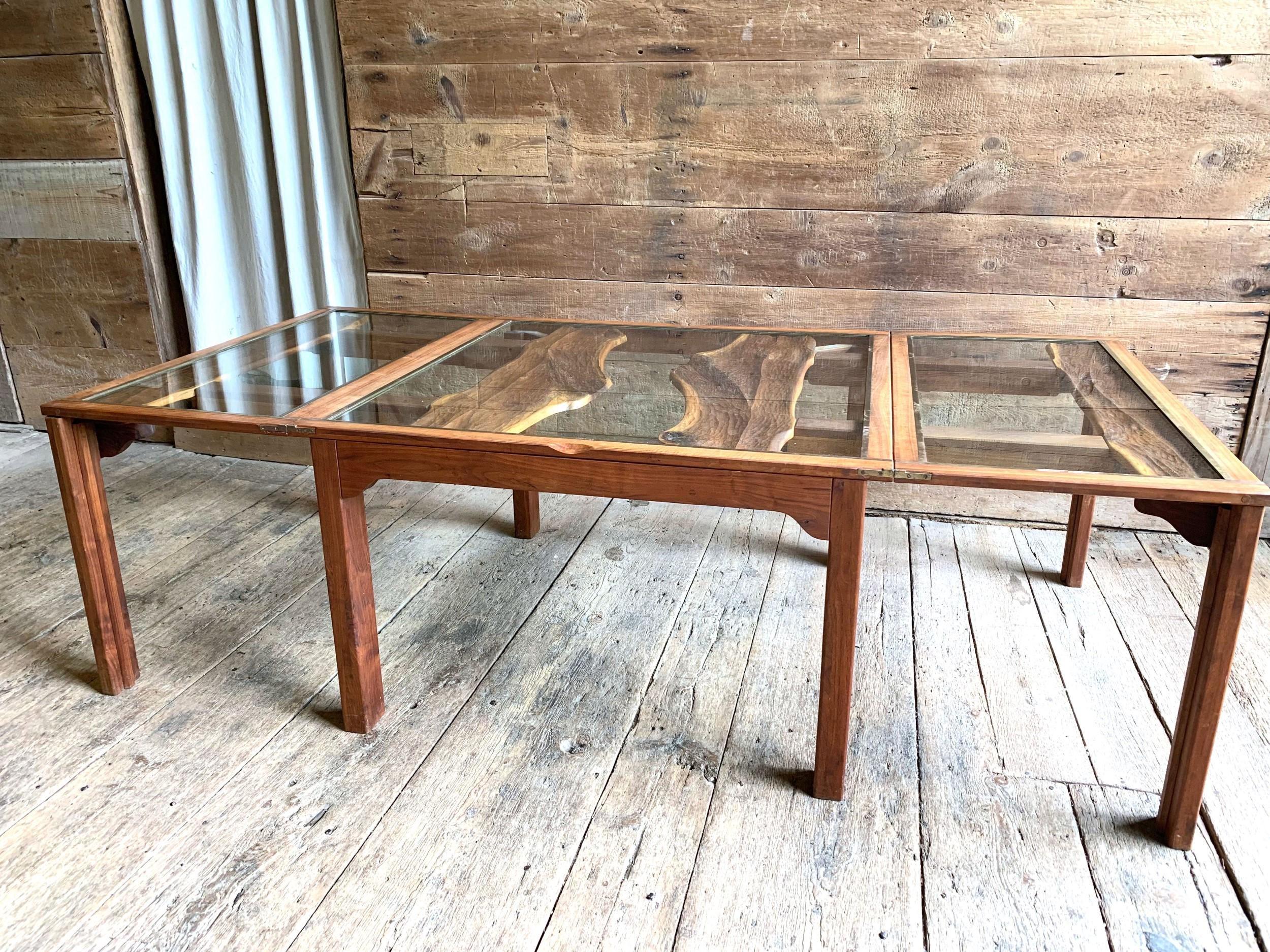 An important folding dining table by Phillip Lloyd Powell, with 