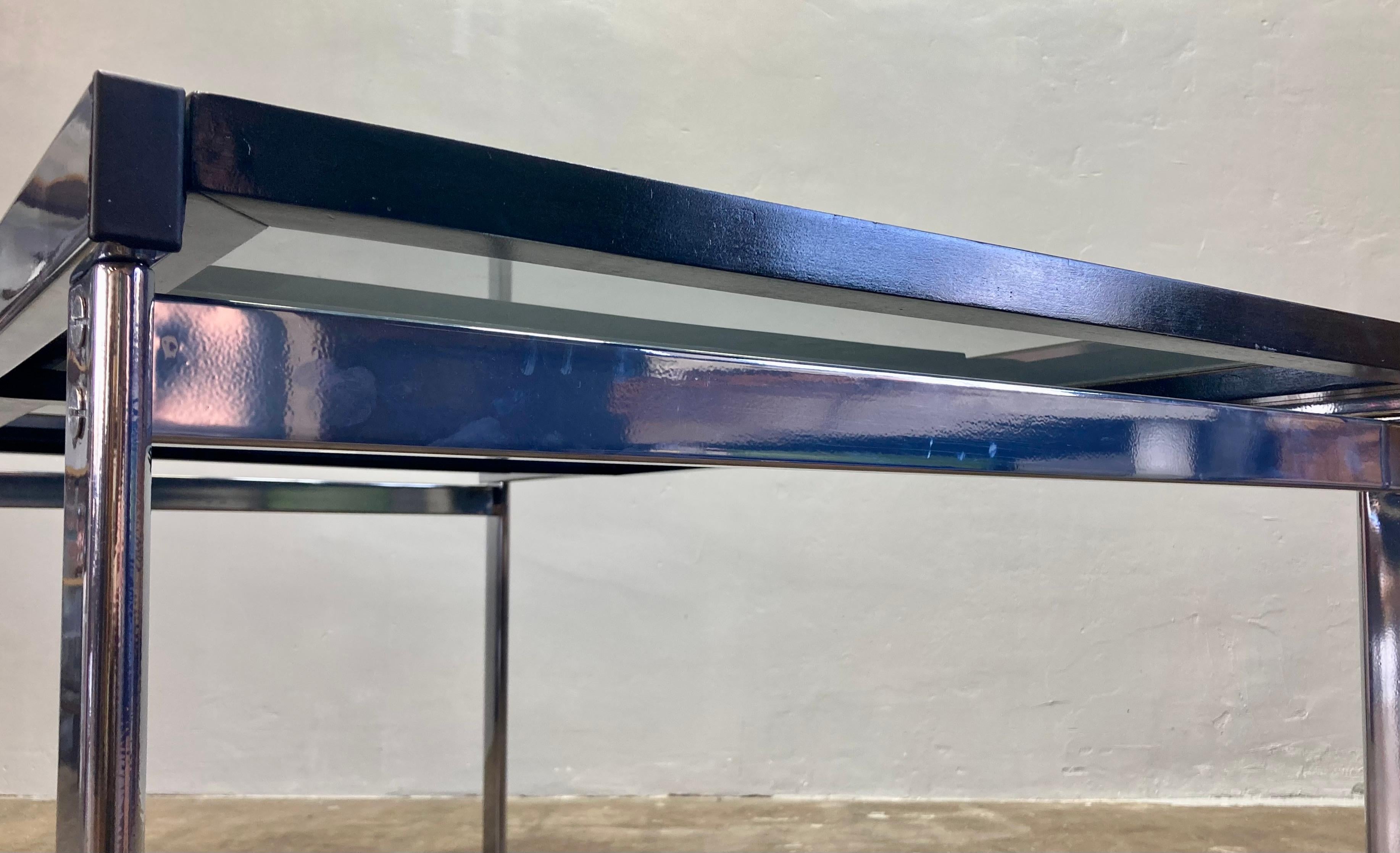 Table extensible en acier et verre en vente 1