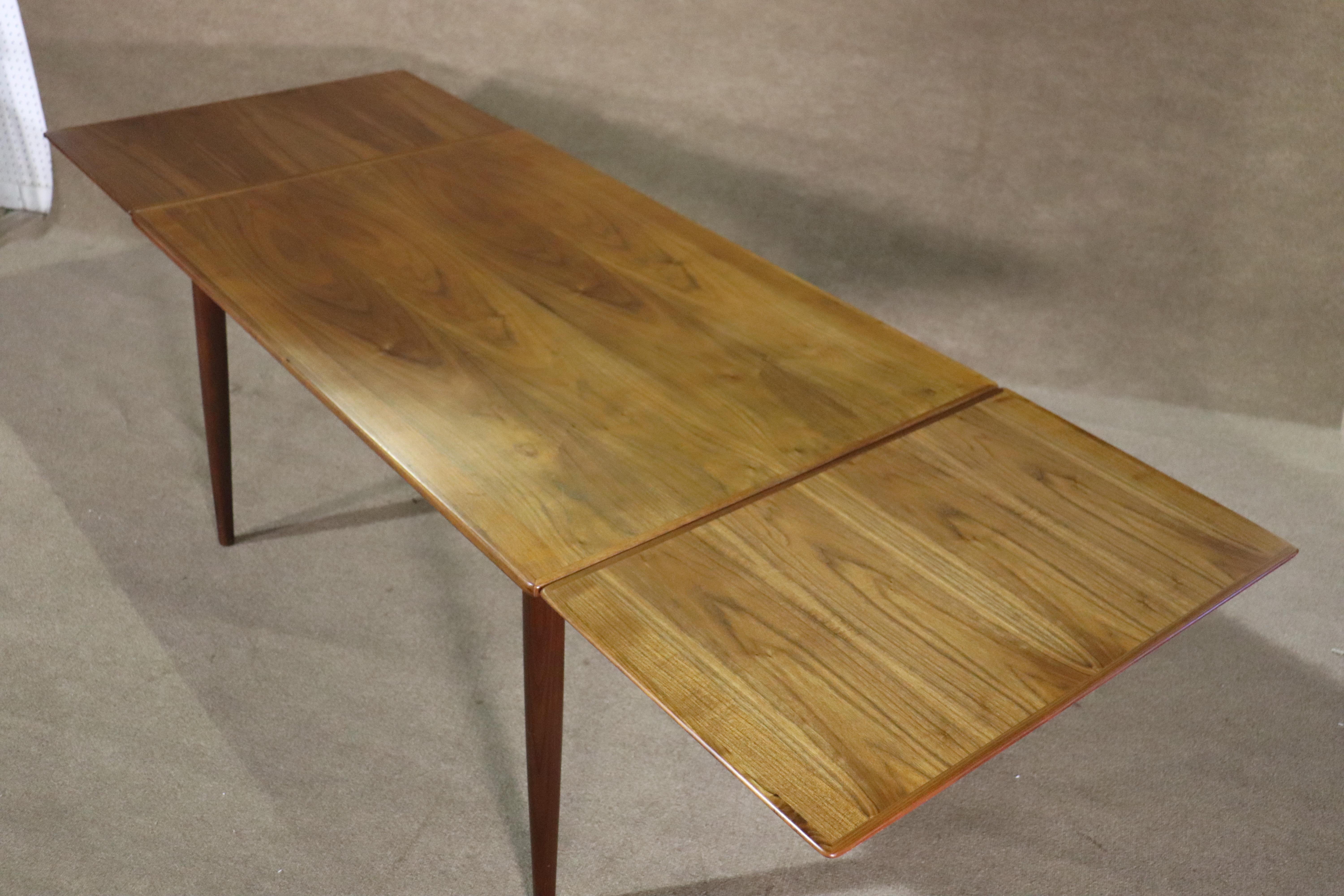 Mid-Century Modern Expanding Teak Dining Table For Sale