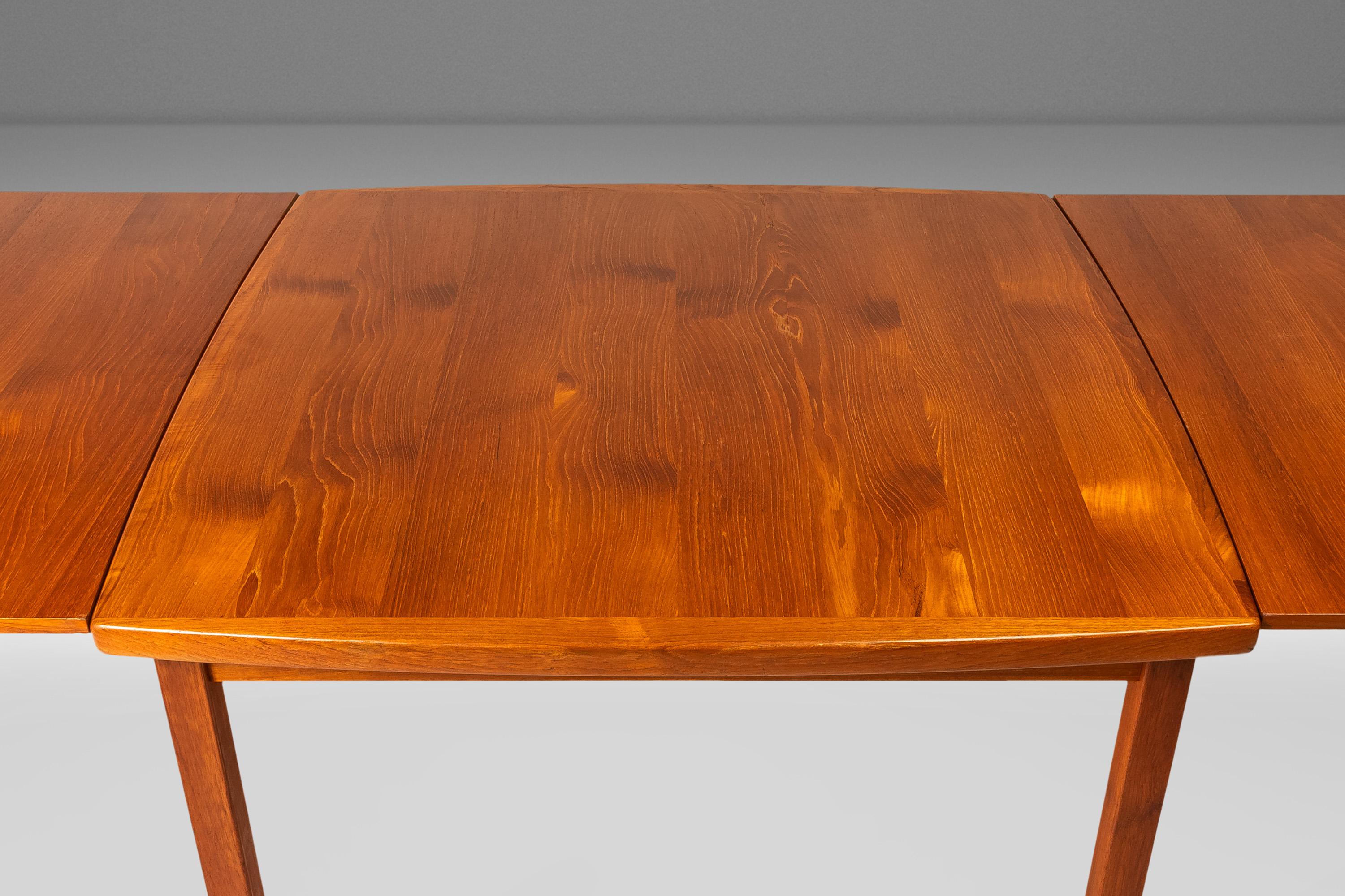 Expansion Dining Table w/ Stow-in-Table Leaves in Teak by D-SCAN, c. 1970's For Sale 4