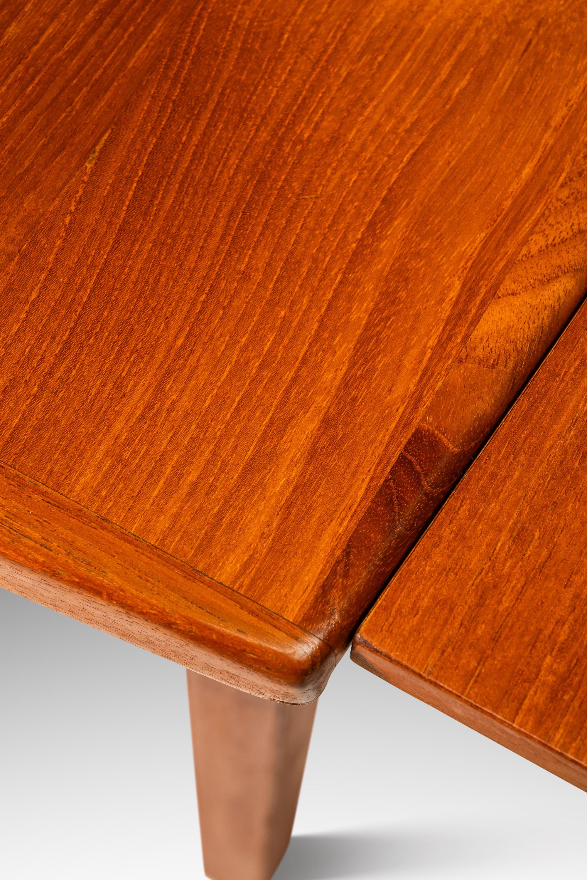 Expansion Dining Table w/ Stow-in-Table Leaves in Teak by D-SCAN, c. 1970's For Sale 11