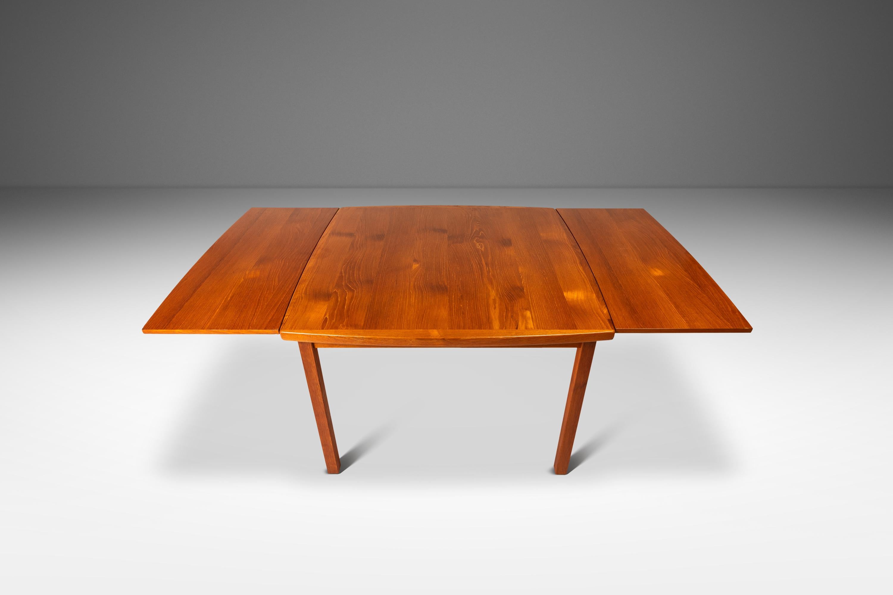 Late 20th Century Expansion Dining Table w/ Stow-in-Table Leaves in Teak by D-SCAN, c. 1970's For Sale
